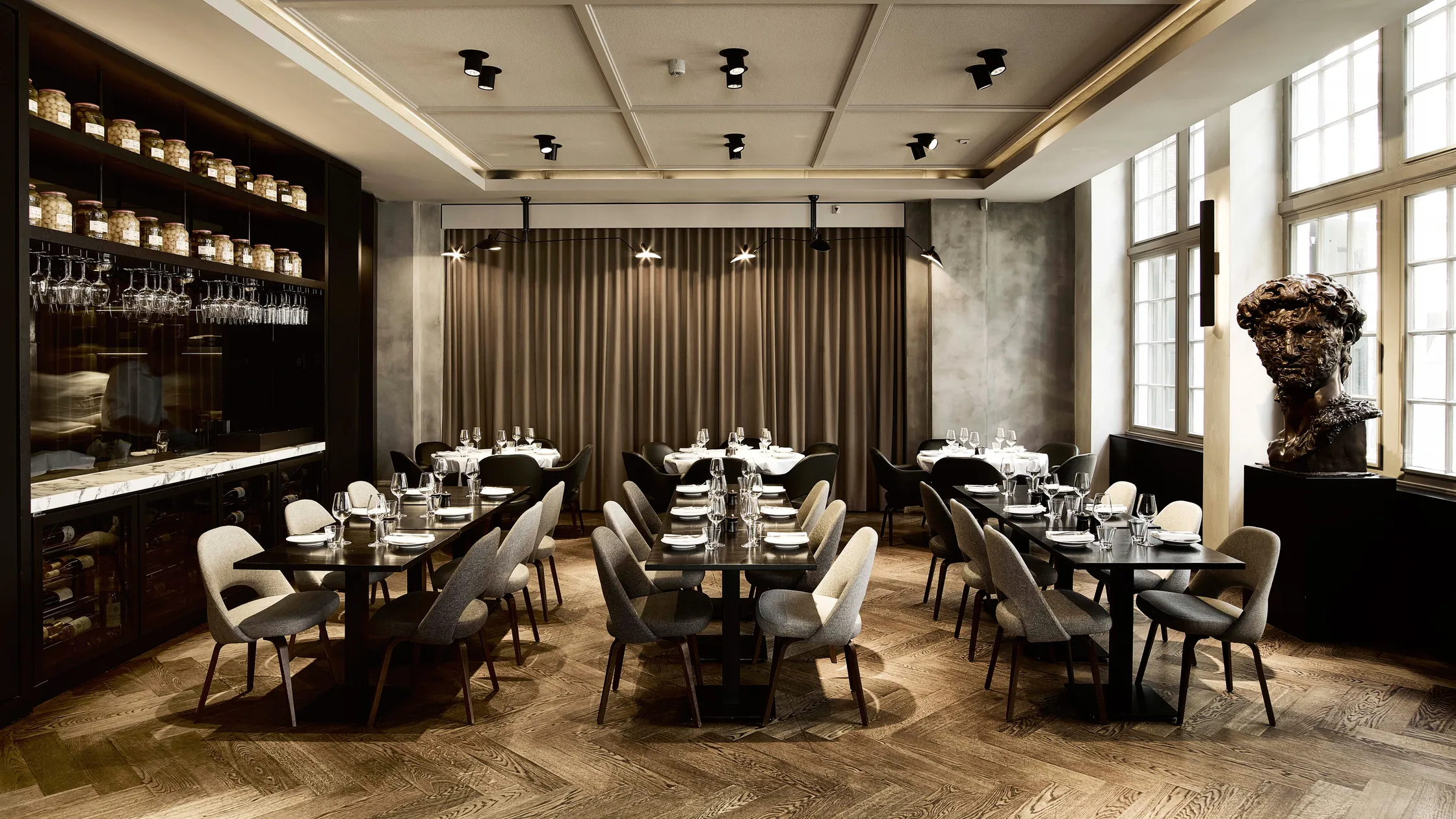 A close-up shot of a handcrafted welcome cocktail served at a Mediterranean hotel patio