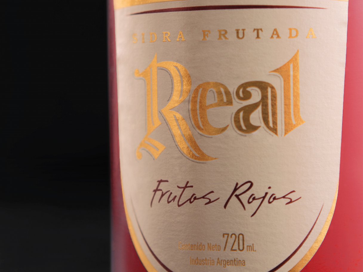 Rooftops of a coastal town with the sea in background