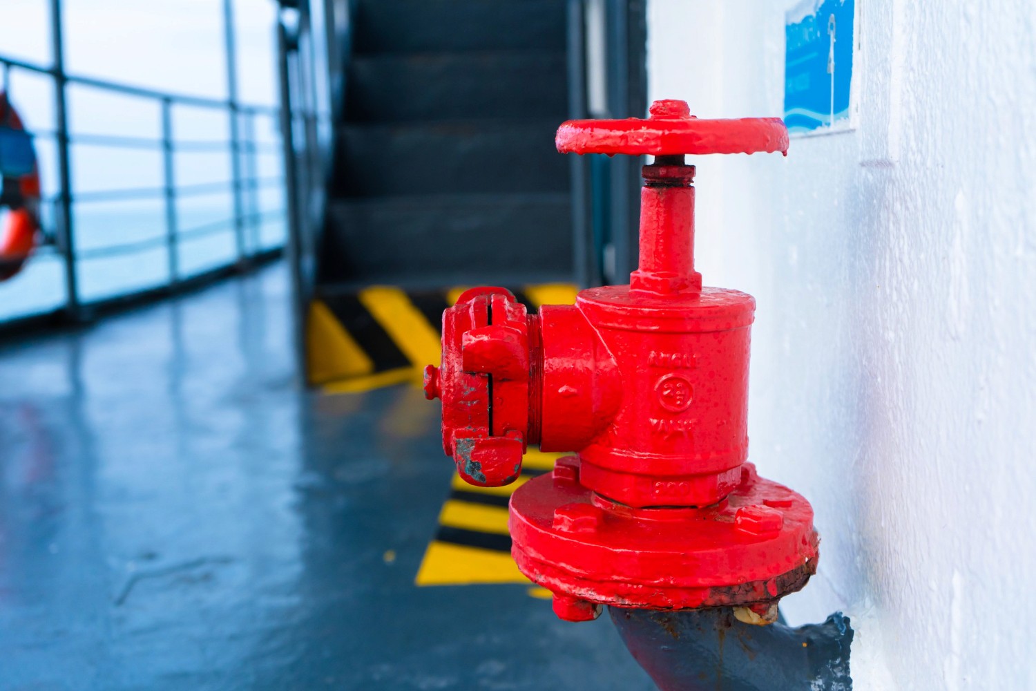 A fire hydrant next to stairs