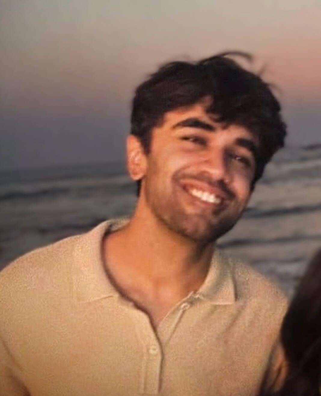 grayscale photography of man smiling