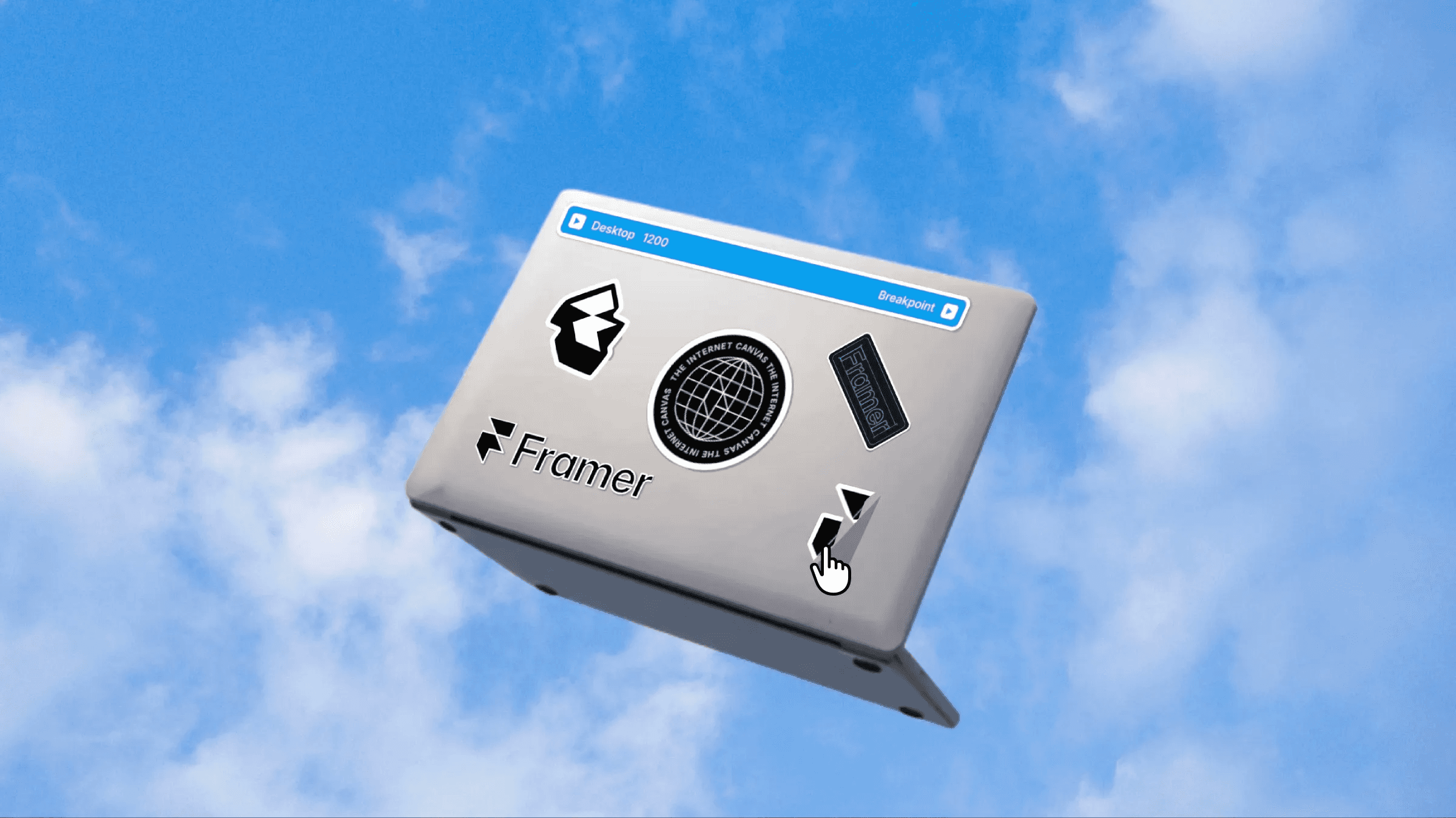 Laptop with Framer logo and tech stickers floating