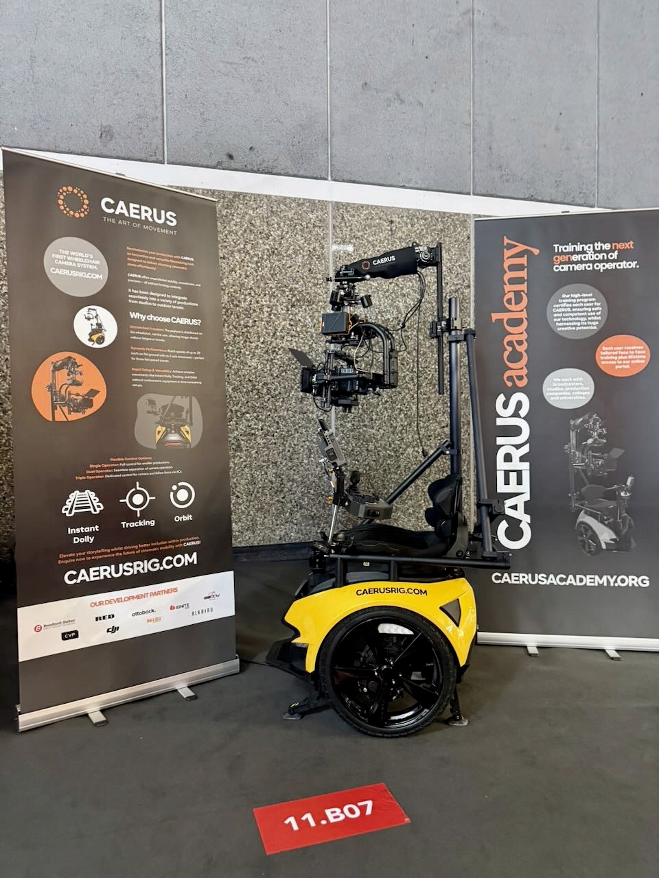 Image of CAERUS in between two popup banner stands within our display at IBC 2025