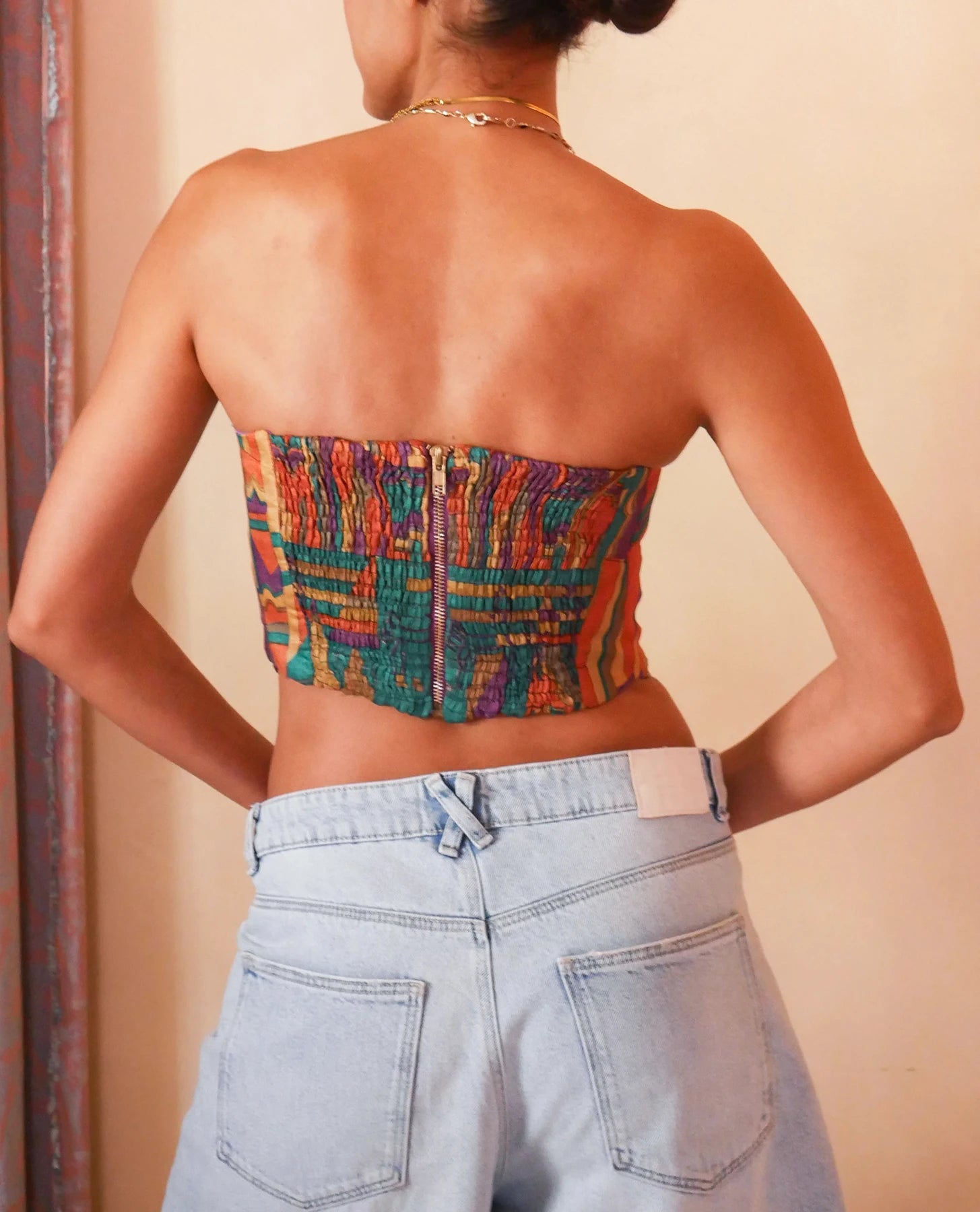 SAHIRA paisley silk corset handcrafted from vintage saree with lace-up panels, smocked back and metal zipper.