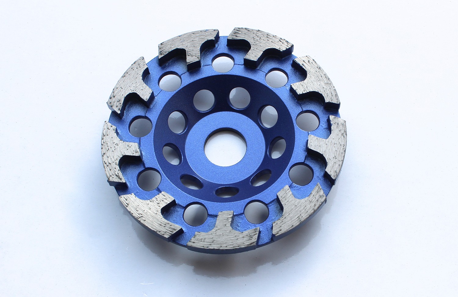 Blue Diamond grinding cup wheel with multiple segments for effective grinding of concrete and stone materials.