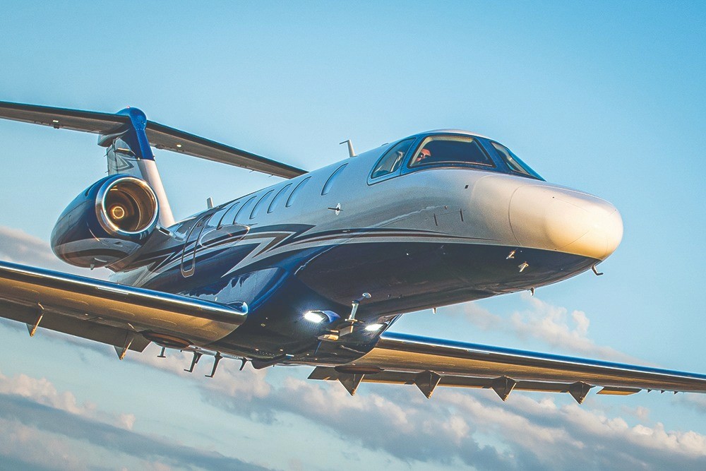 The Cessna Citation CJ4 Gen2 is a member of the CitationJet family of light business jets produced by Textron Aviation. It is an upgraded version of the CJ4, with improved avionics, a redesigned interior, and other enhancements.      The CJ4 Gen2 features a Williams International FJ44-4A turbofan engine, which provides a maximum cruise speed of 451 knots and a maximum range of 2,165 nautical miles. It has a maximum seating capacity of ten passengers and a maximum takeoff weight of 17,110 pounds.     The cockpit of the CJ4 Gen2 features the Garmin G5000 avionics suite, which includes dual primary flight displays, a multifunction display, and a digital autopilot. It also features a Synthetic Vision System, which provides 3D representations of the terrain and obstacles, enhancing situational awareness.      The cabin of the CJ4 Gen2 is spacious and comfortable, with a height of 57 inches and a width of 58 inches. The cabin has six individual seats and a side-facing couch, as well as a fully enclosed lavatory.     The CJ4 Gen2 also features a number of other enhancements, including LED lighting, improved sound insulation, and updated cabin management controls. It is a popular choice for business travellers and charter operators, as it offers a combination of speed, range, and comfort in a versatile and reliable package.