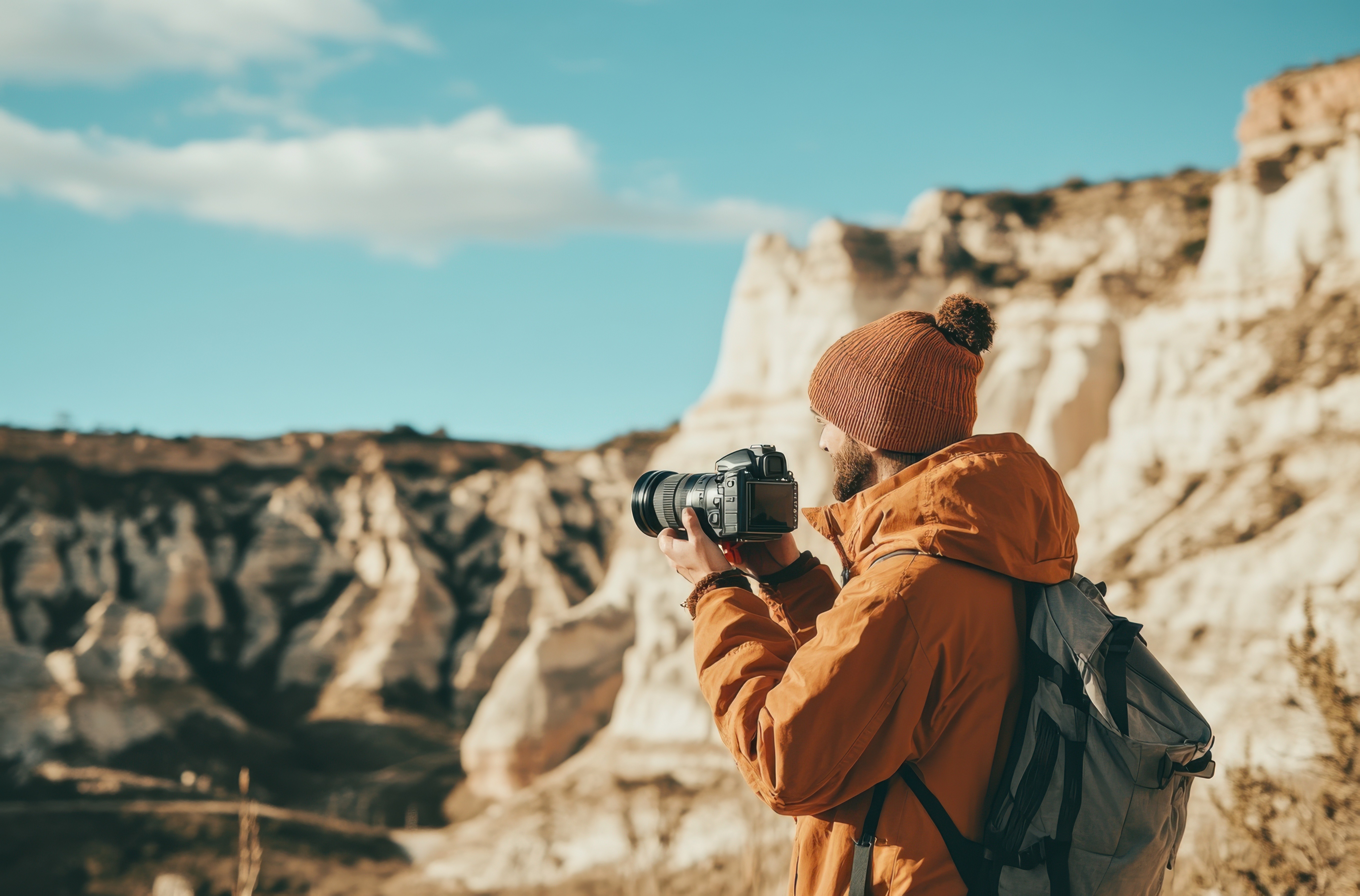 A maroon passport, a credit card, and a document are placed on a dark surface.