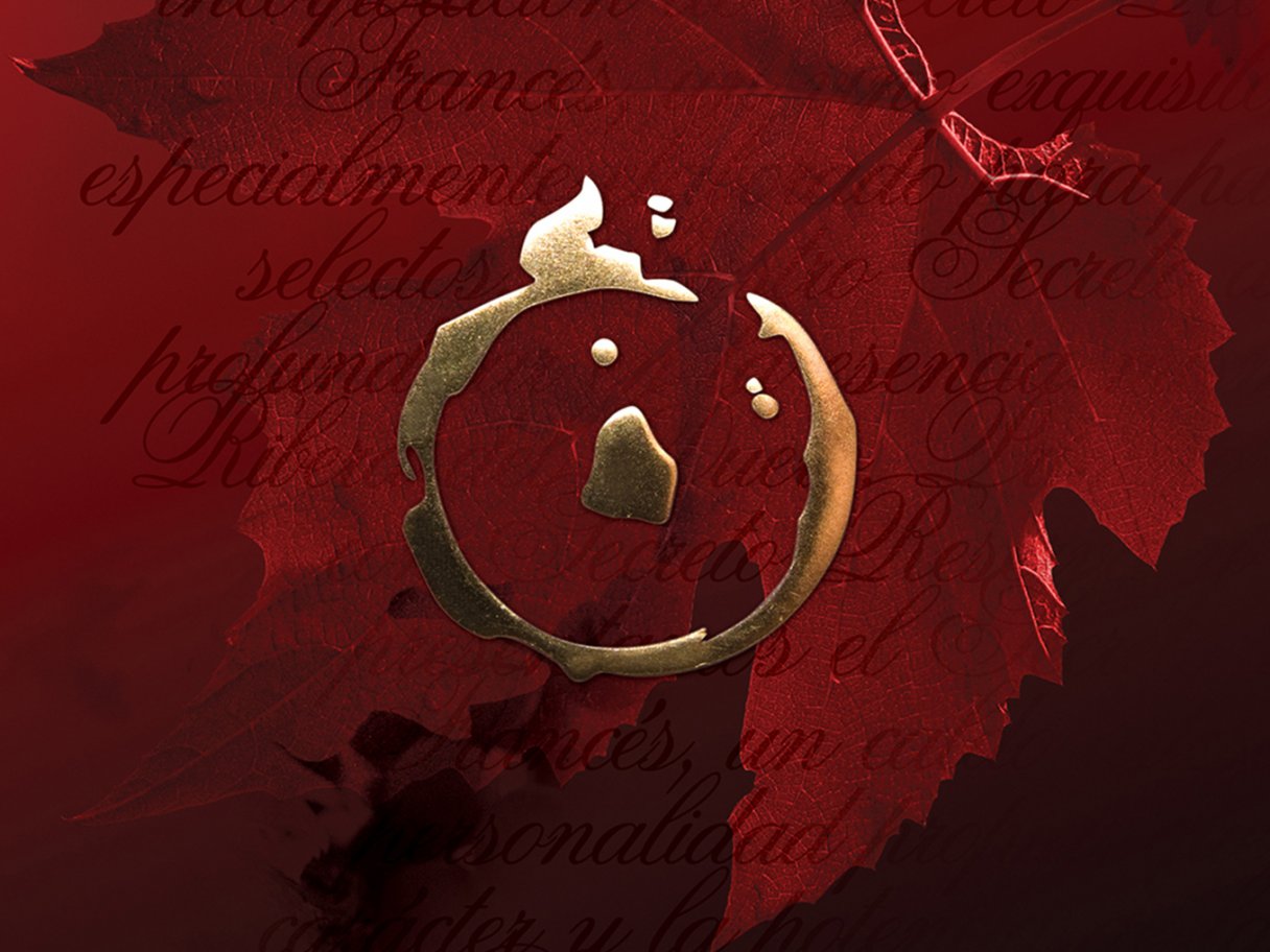 Rustic cabin in a golden field at sunset