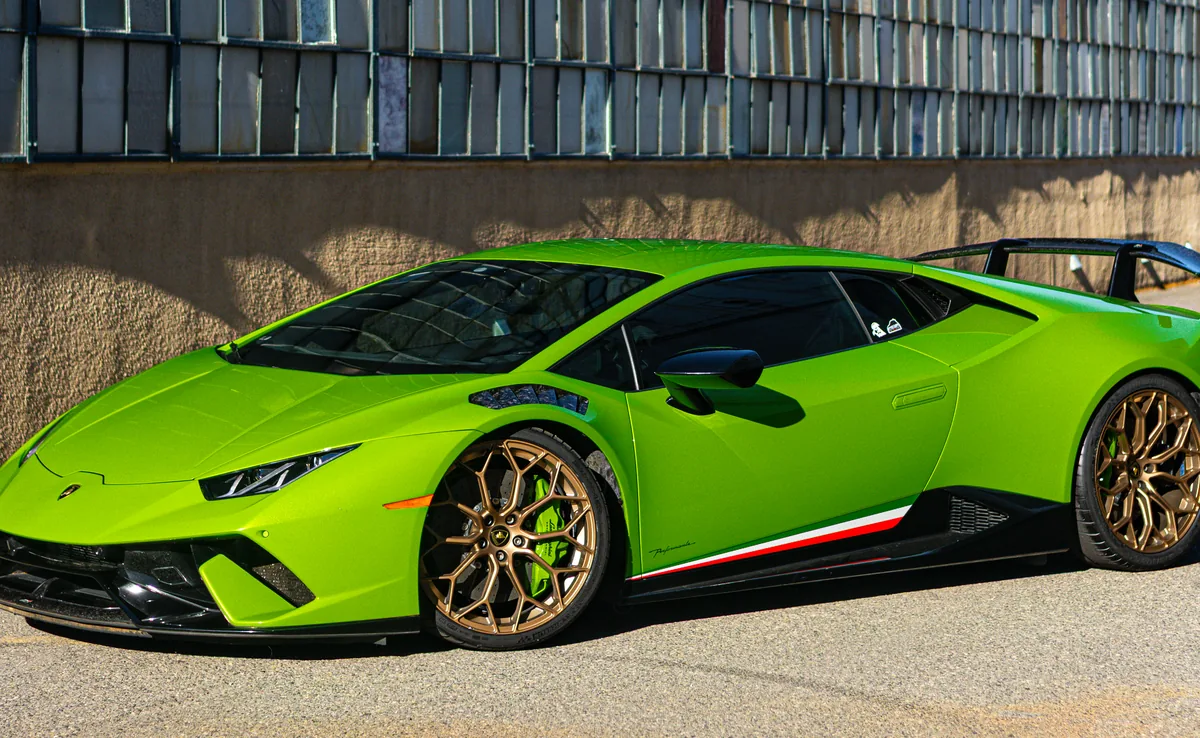 Green Lamborghini Huracán outside 714 Technik in Portland, Oregon