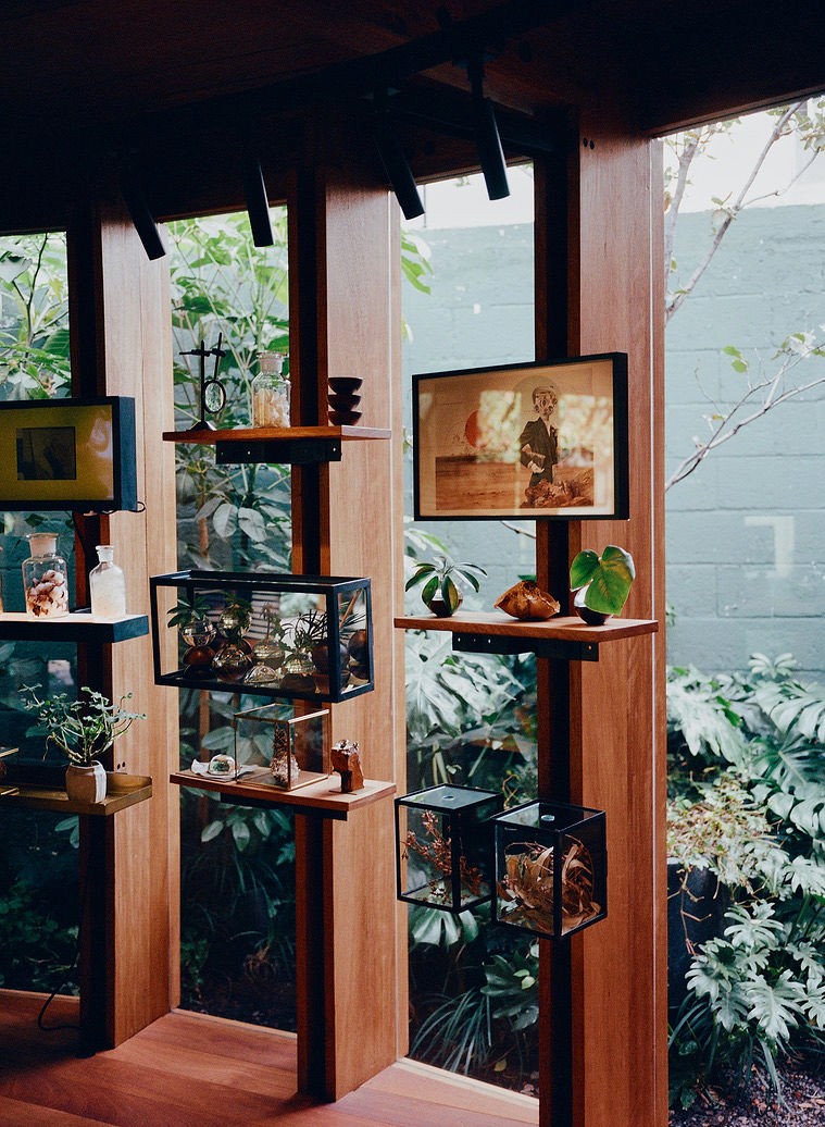 Woman with red hair covering mouth with hair