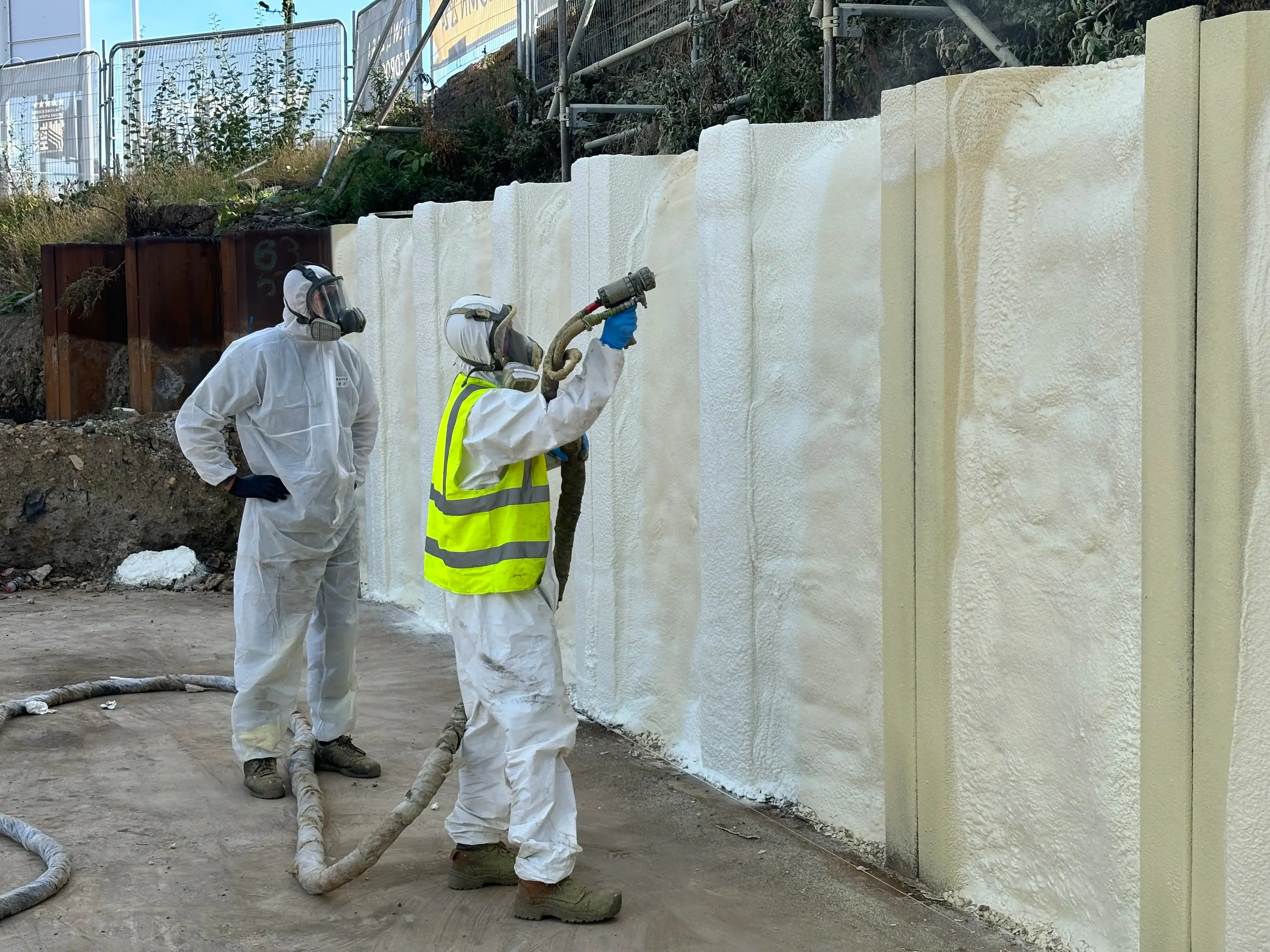 Spray foam insulation workers