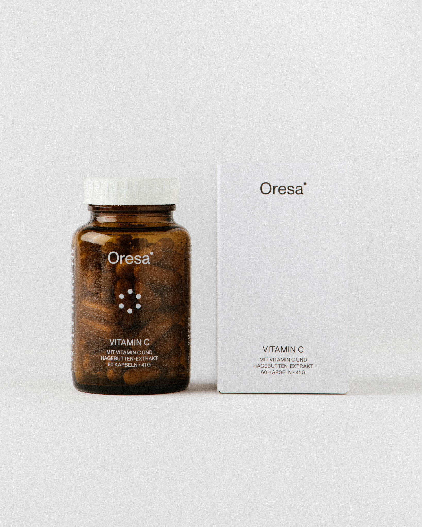 Vitamin C von Oresa – Glasdose mit Kapseln und Verpackung