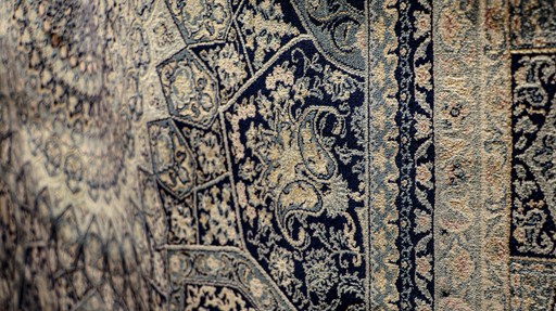 a close up of a rug on the ground