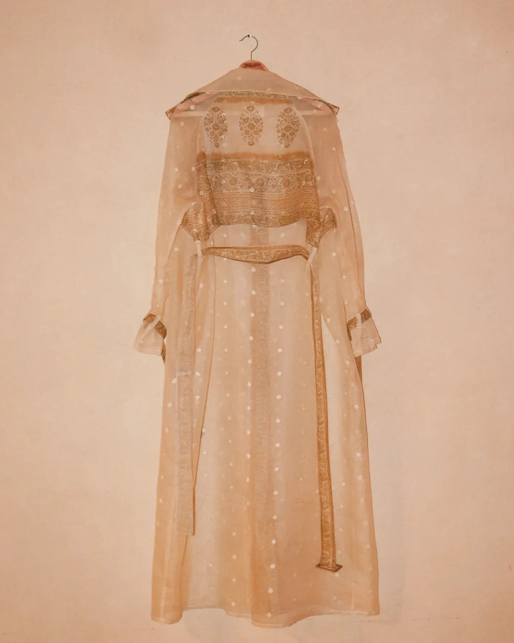 Vedyawhite checkered silk trench coat handcrafted from  silk with relaxed boxy fit, buckle details on arms and waist