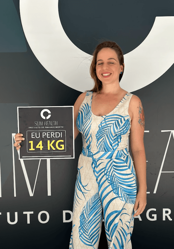 Close-up of a tree stump showing growth rings and a textured brown wood surface.