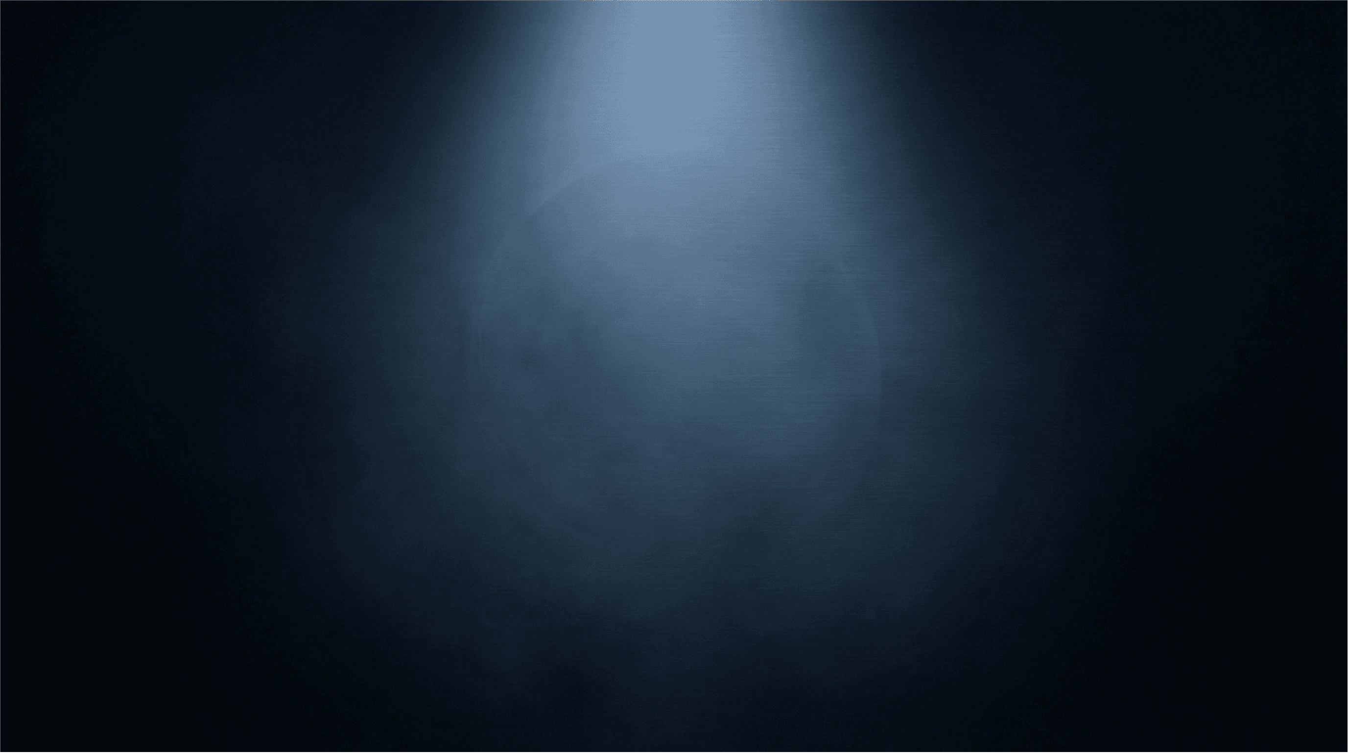 Drone shot of a running track at night