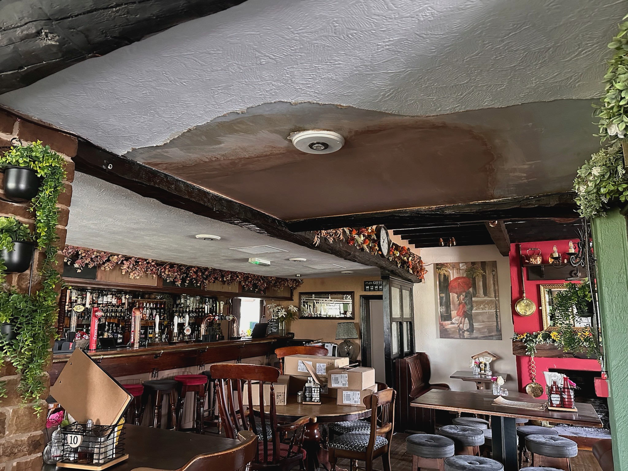 Ceiling patch repair in pub.