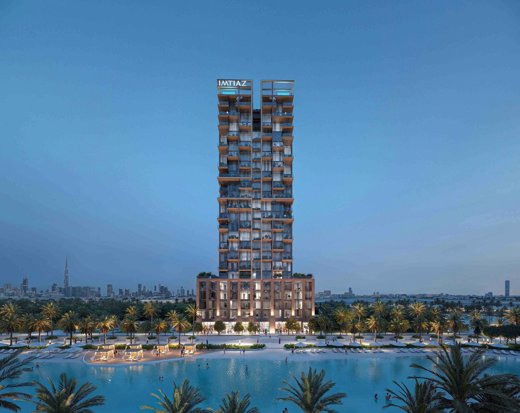 The Wynwood Horizon tower is encircled by vibrant trees and calm water, enhancing the tranquil atmosphere.