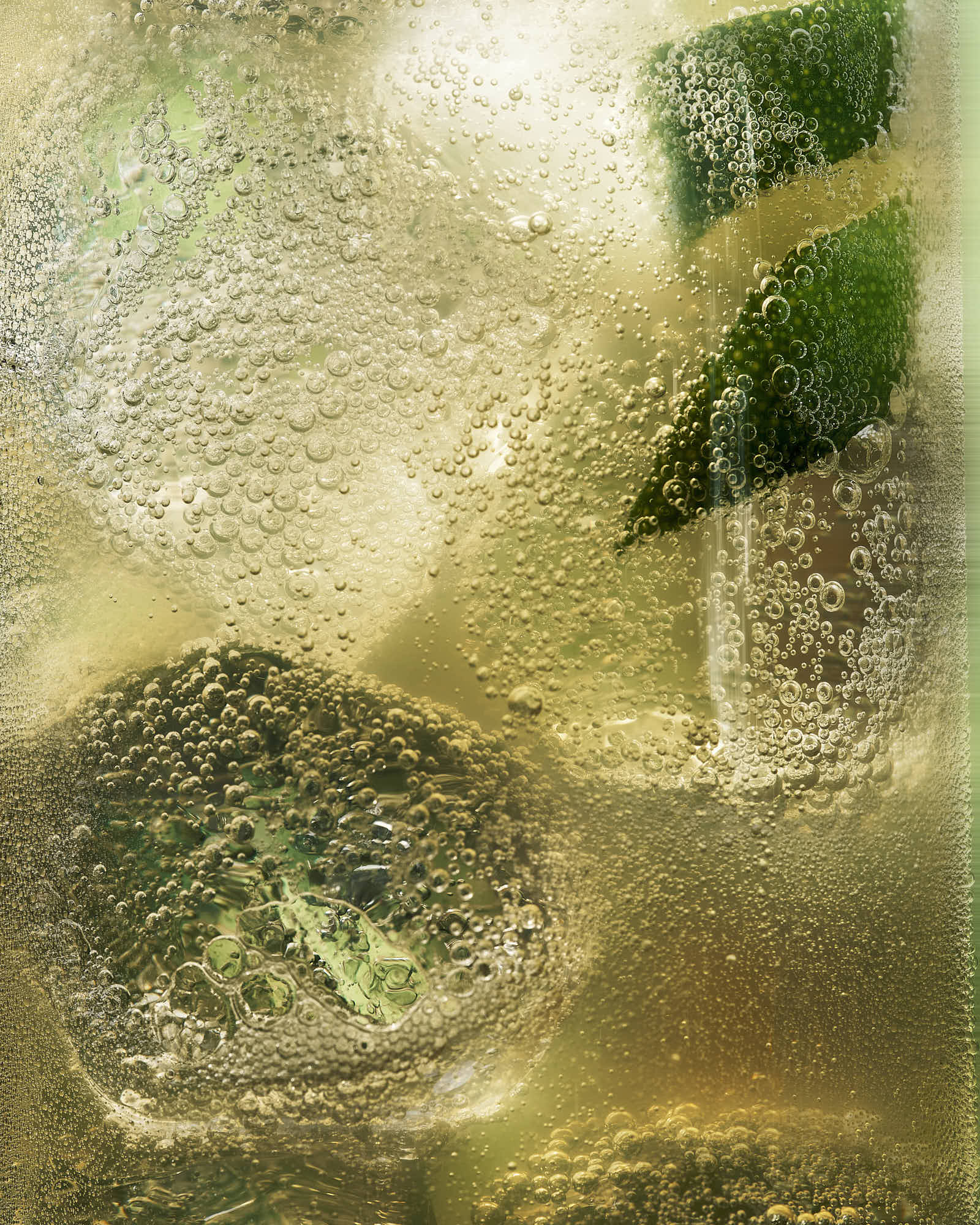 Abstract detail featuring soft colors and organic shapes, of a bubbly cockta