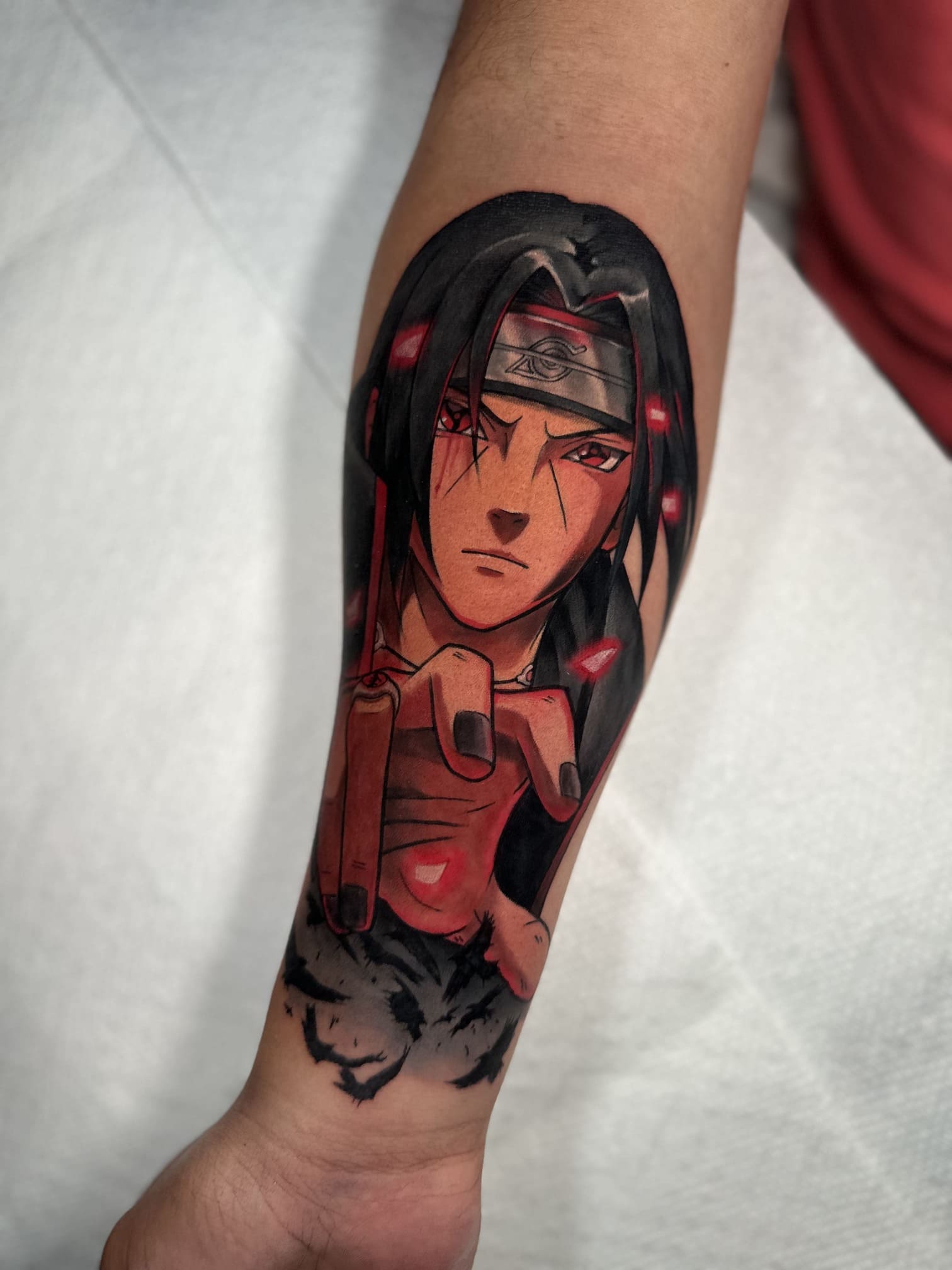Itachi Uchiha Tattoo: The Power of Genjutsu in Full Color