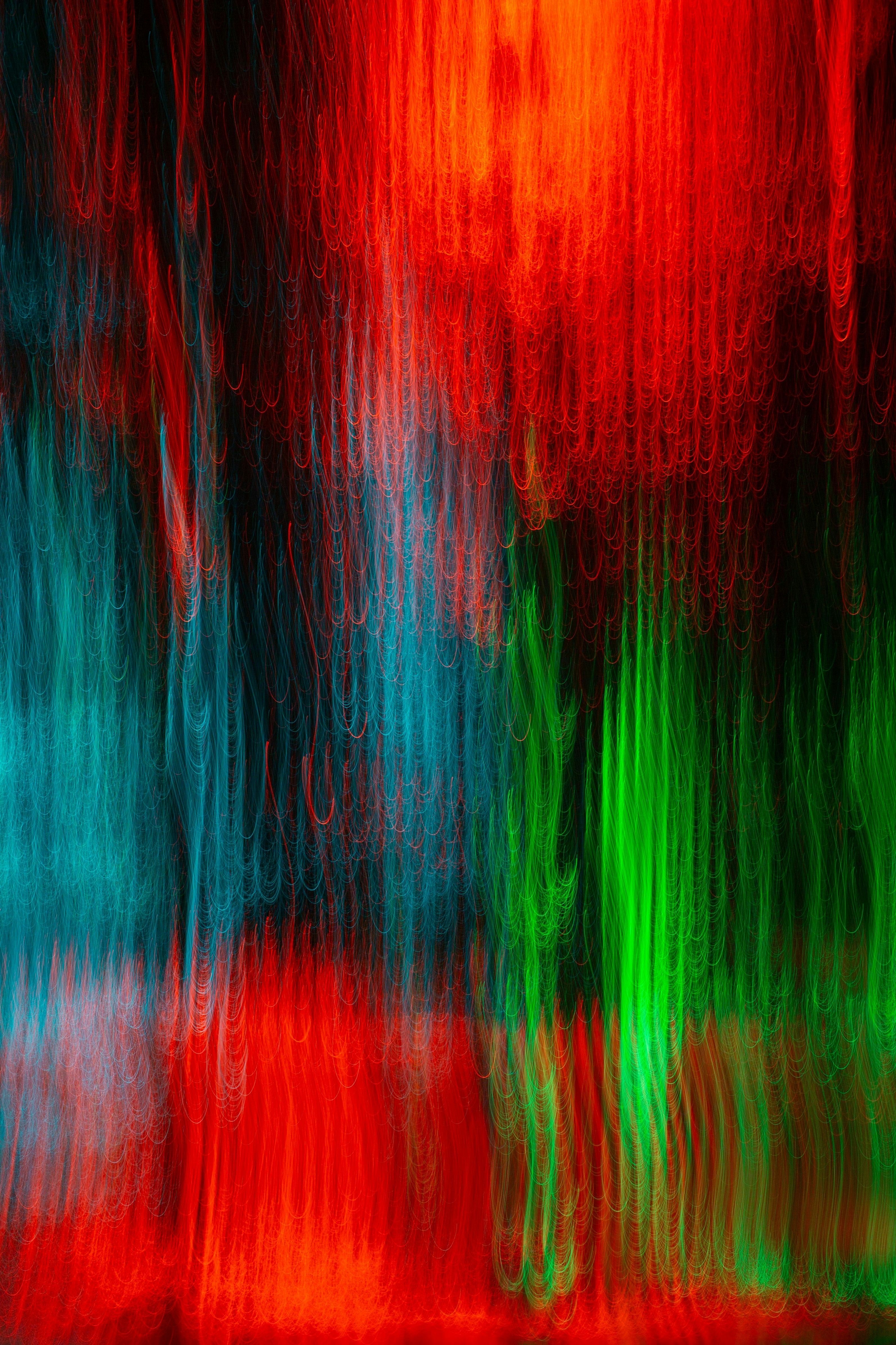 Abstract streaks of red, blue, and green light.