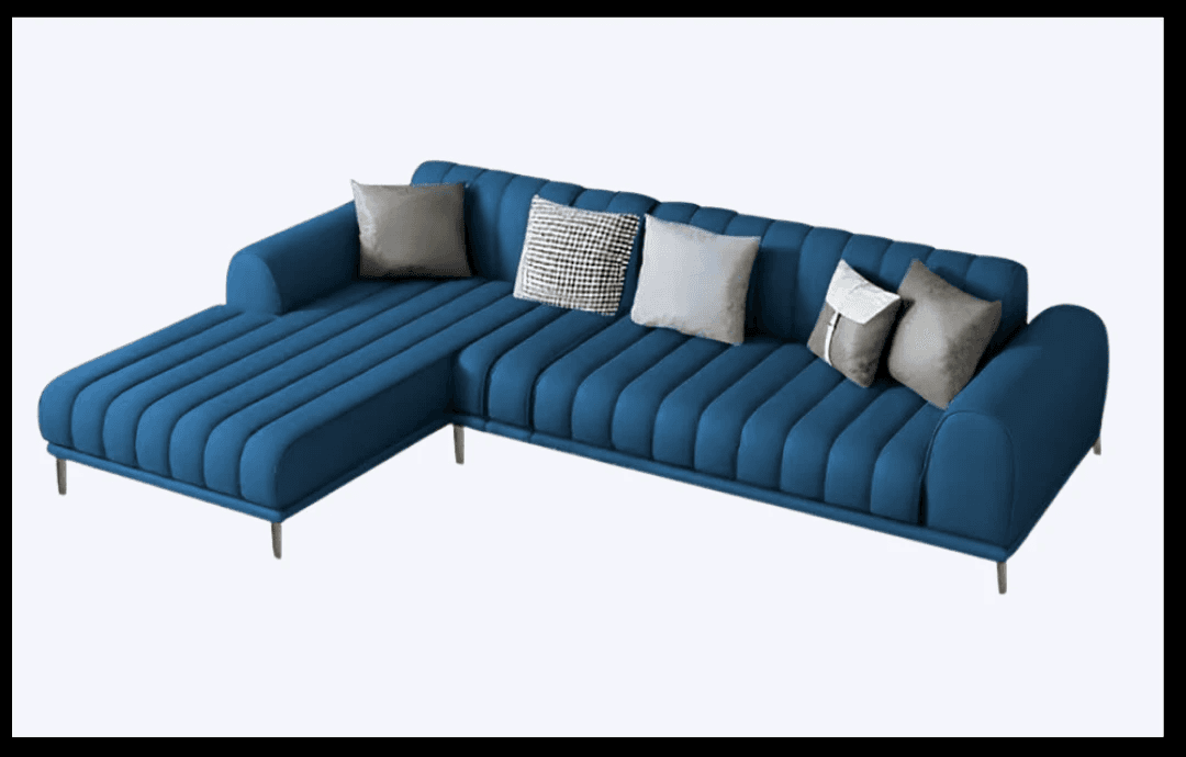 Blue tufted chaise with soft curves and bold presence.
