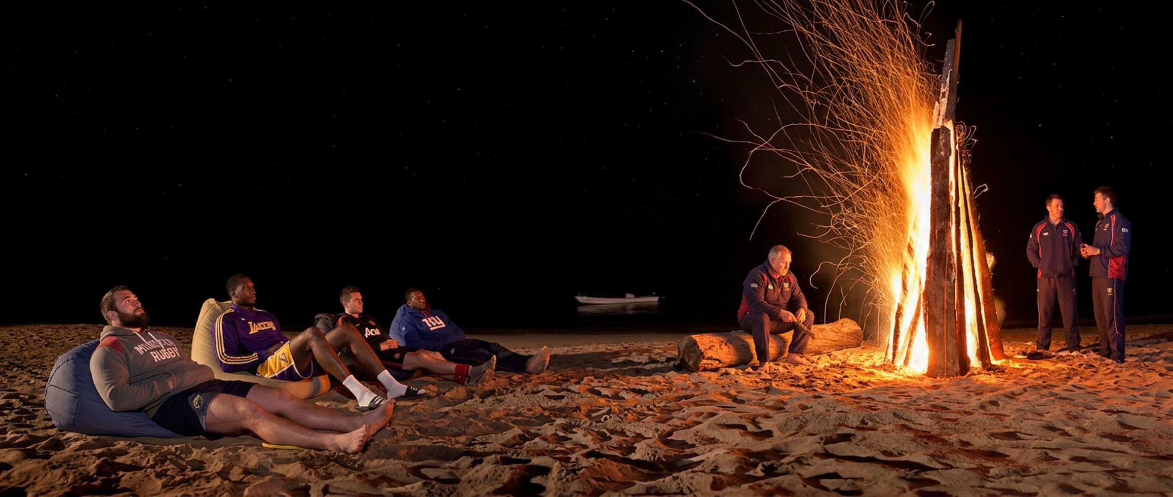 a group of friends enjoying at a bonfire at the beach in Fiji nightime