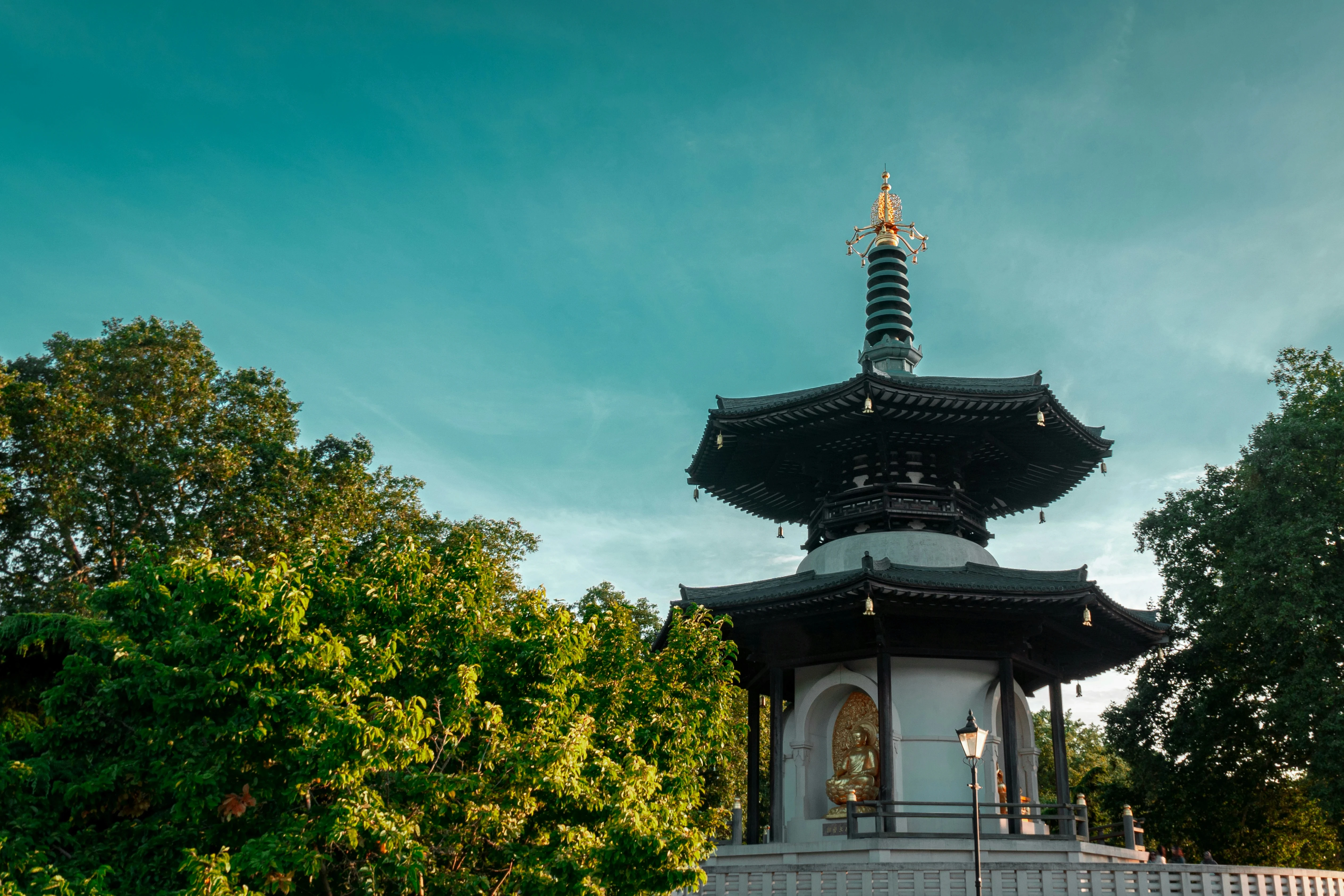 concrete high rise buildings beside bridge at daytime