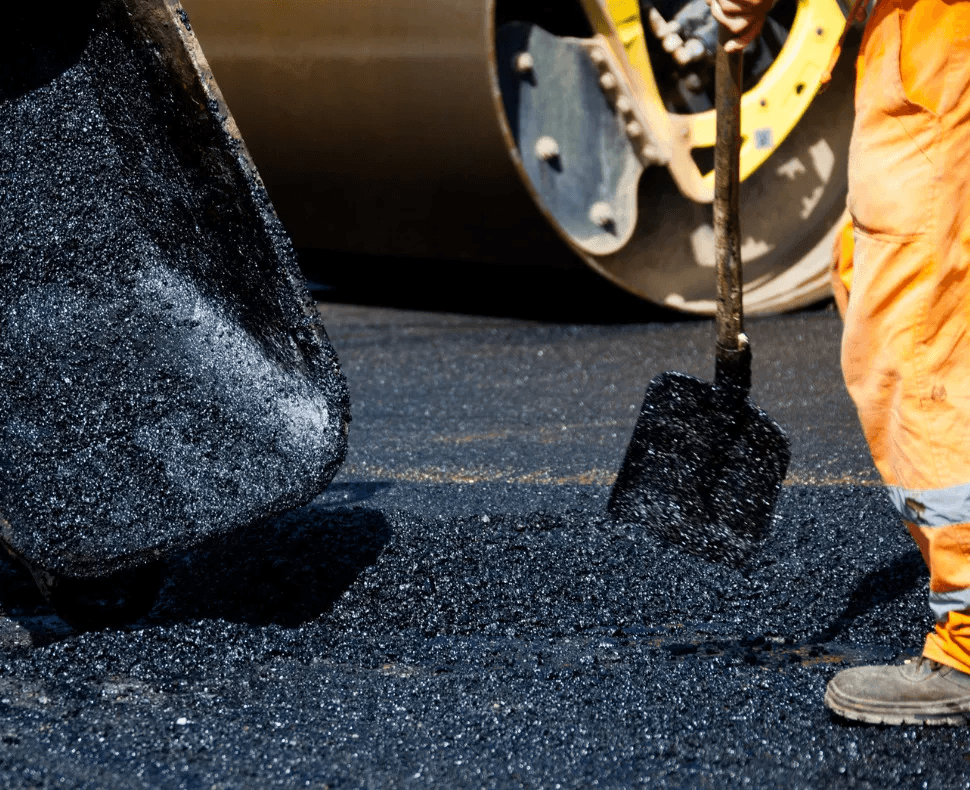 yellow and black heavy equipment on road during daytime