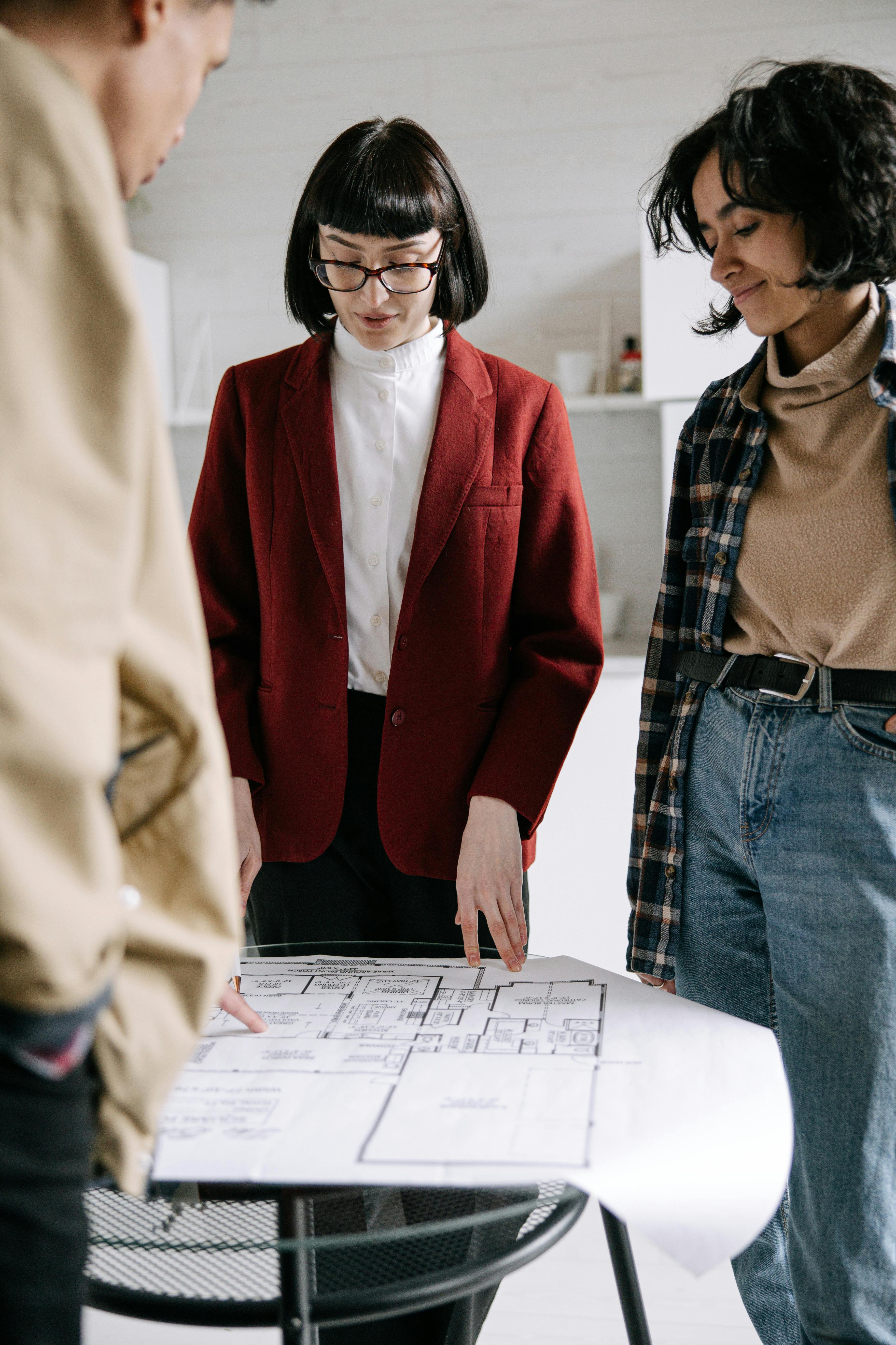 A couple looking at a property floor plan
