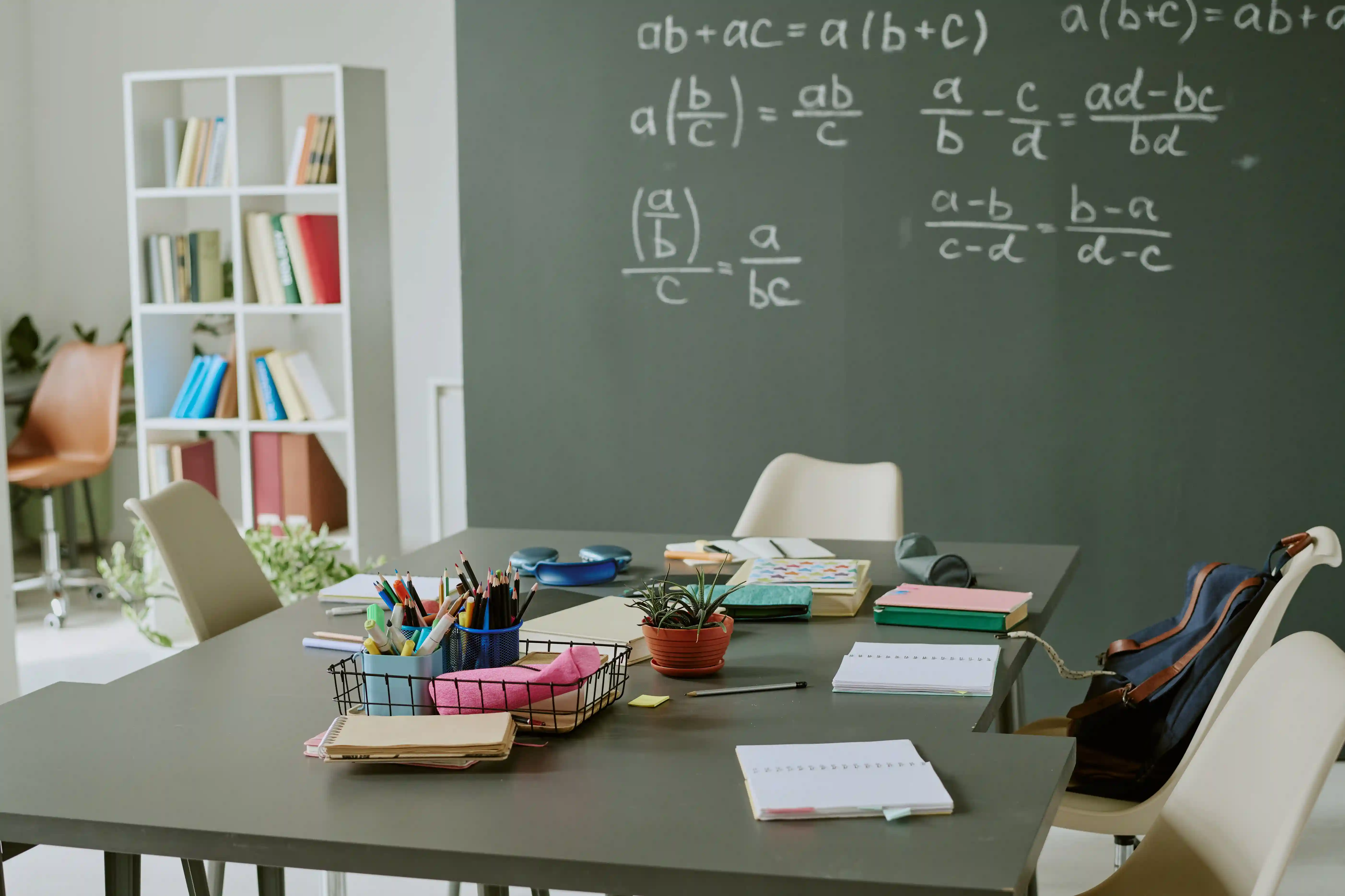 Mathematics tuition classroom in Singapore with equations on a chalkboard