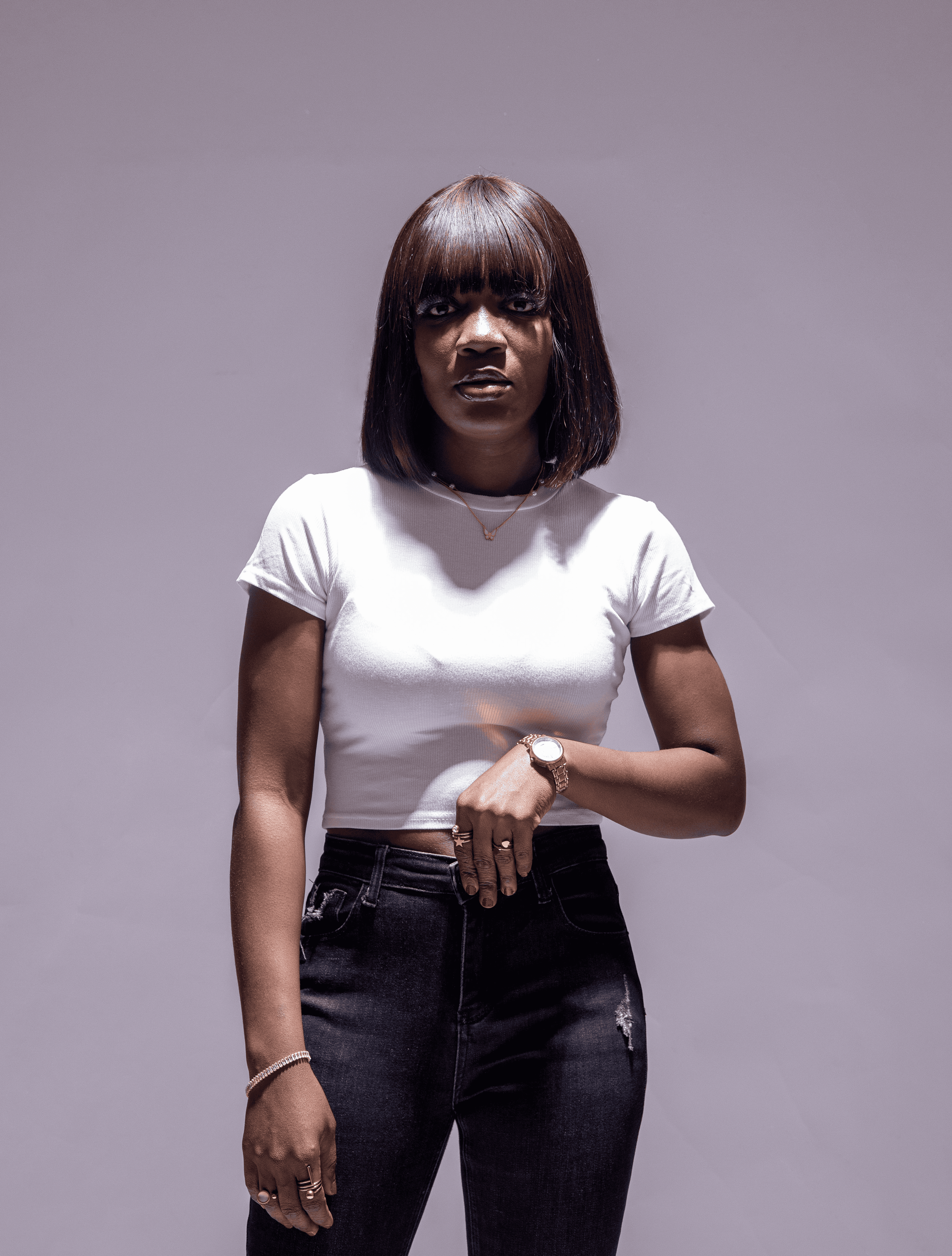 white concrete house near green tree during daytime