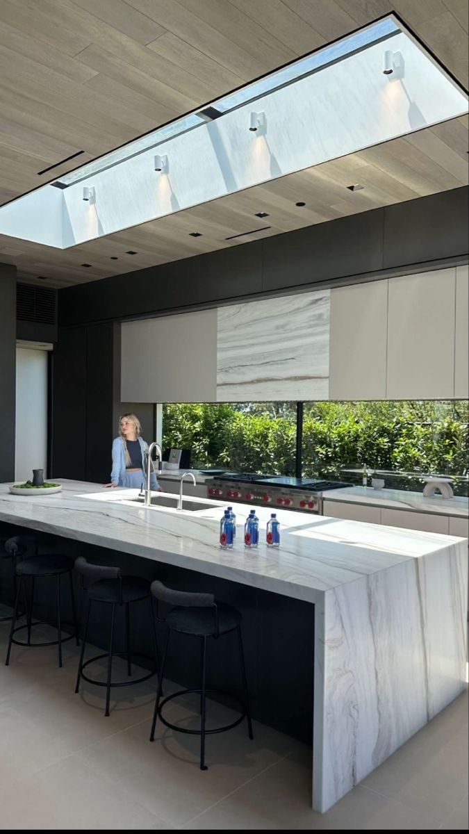 A building with a roof blanketed in snow, showcasing a winter landscape.