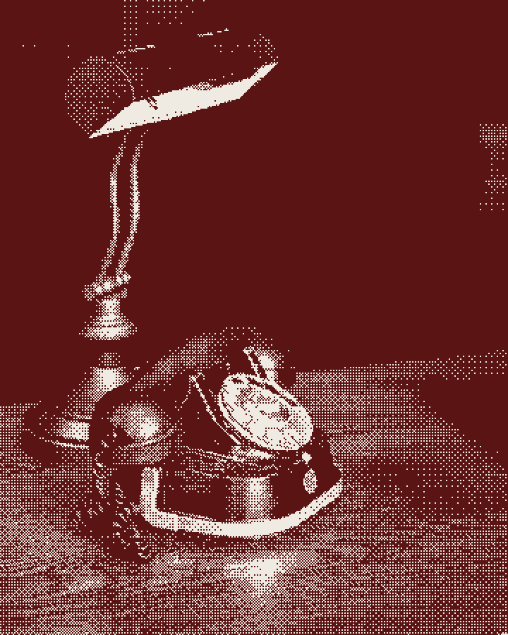A desk lamp and a telephone
