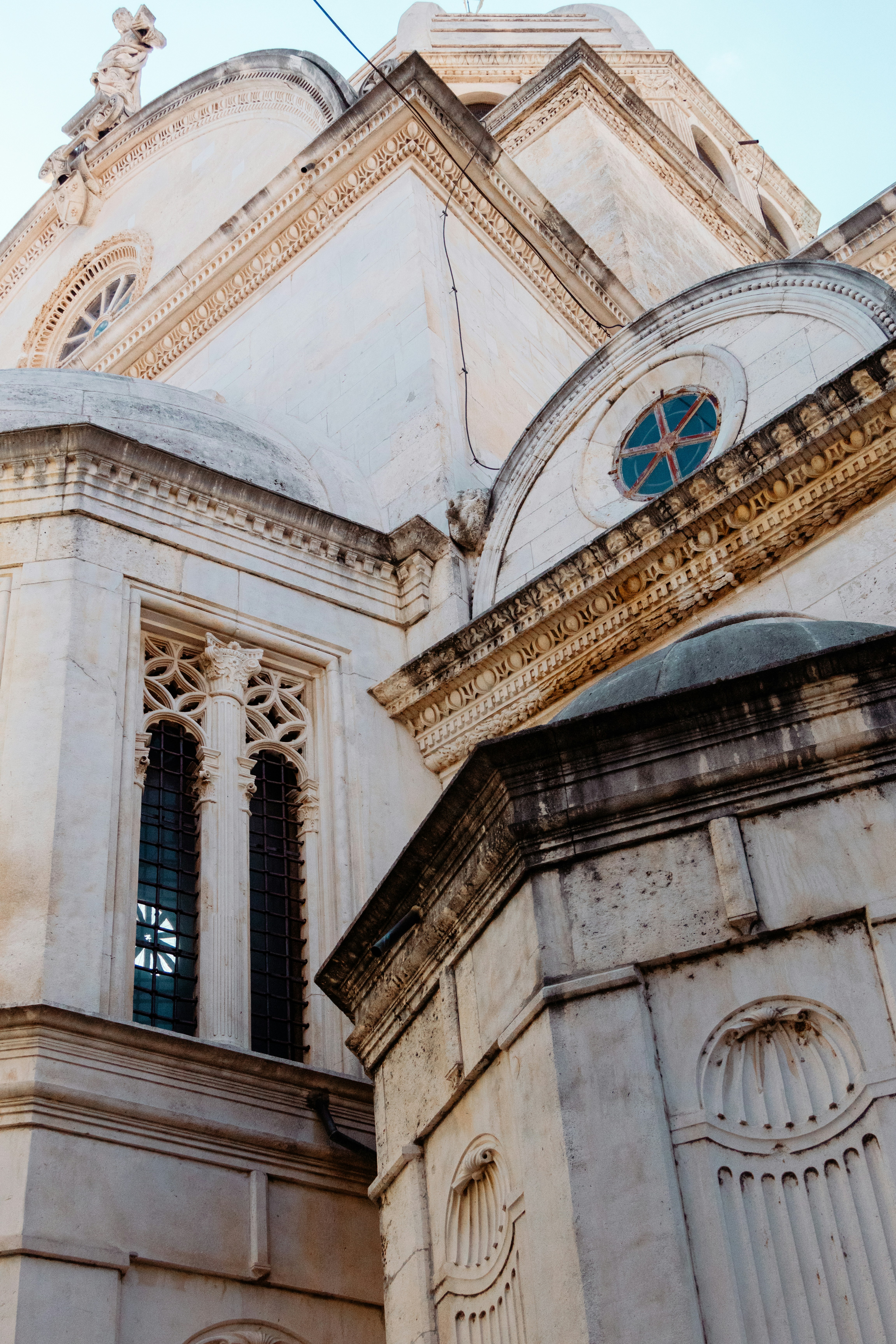 a large building with a clock on it's side