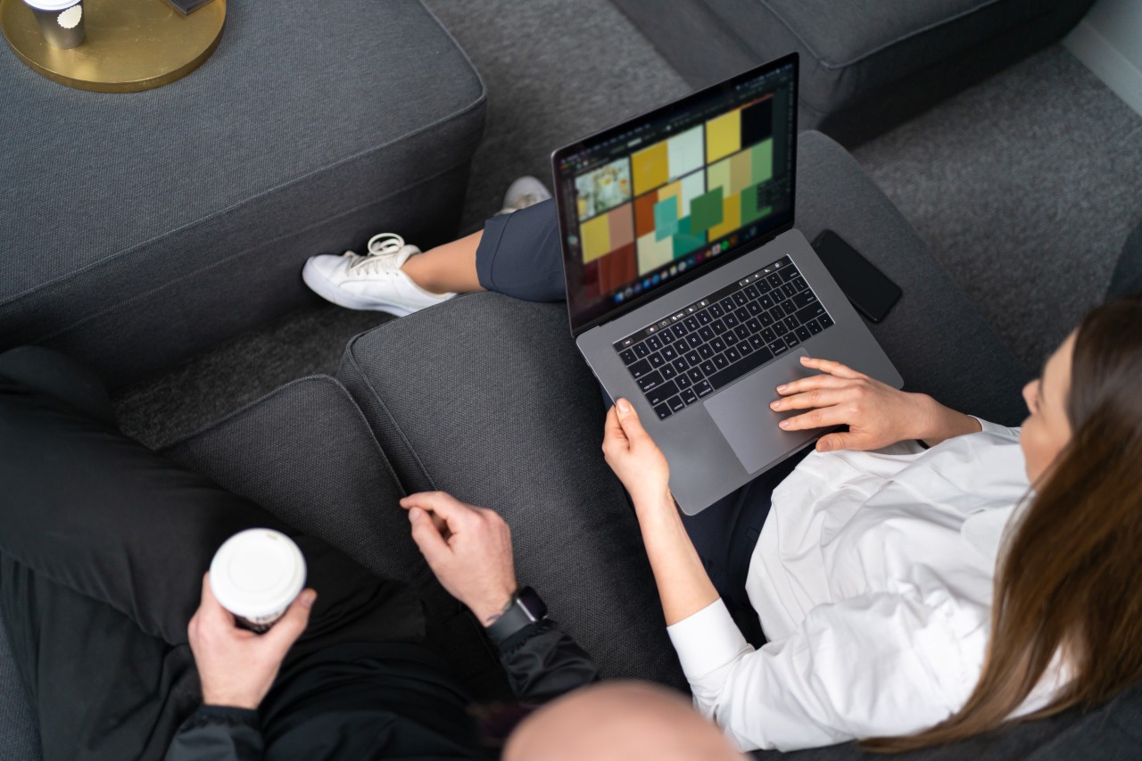 Two People with a Laptop