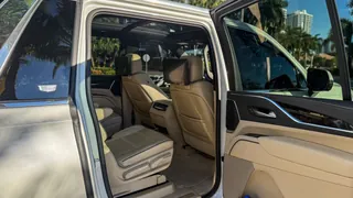 Cadillac Escalade ESV open rear passenger door and second-row cabin