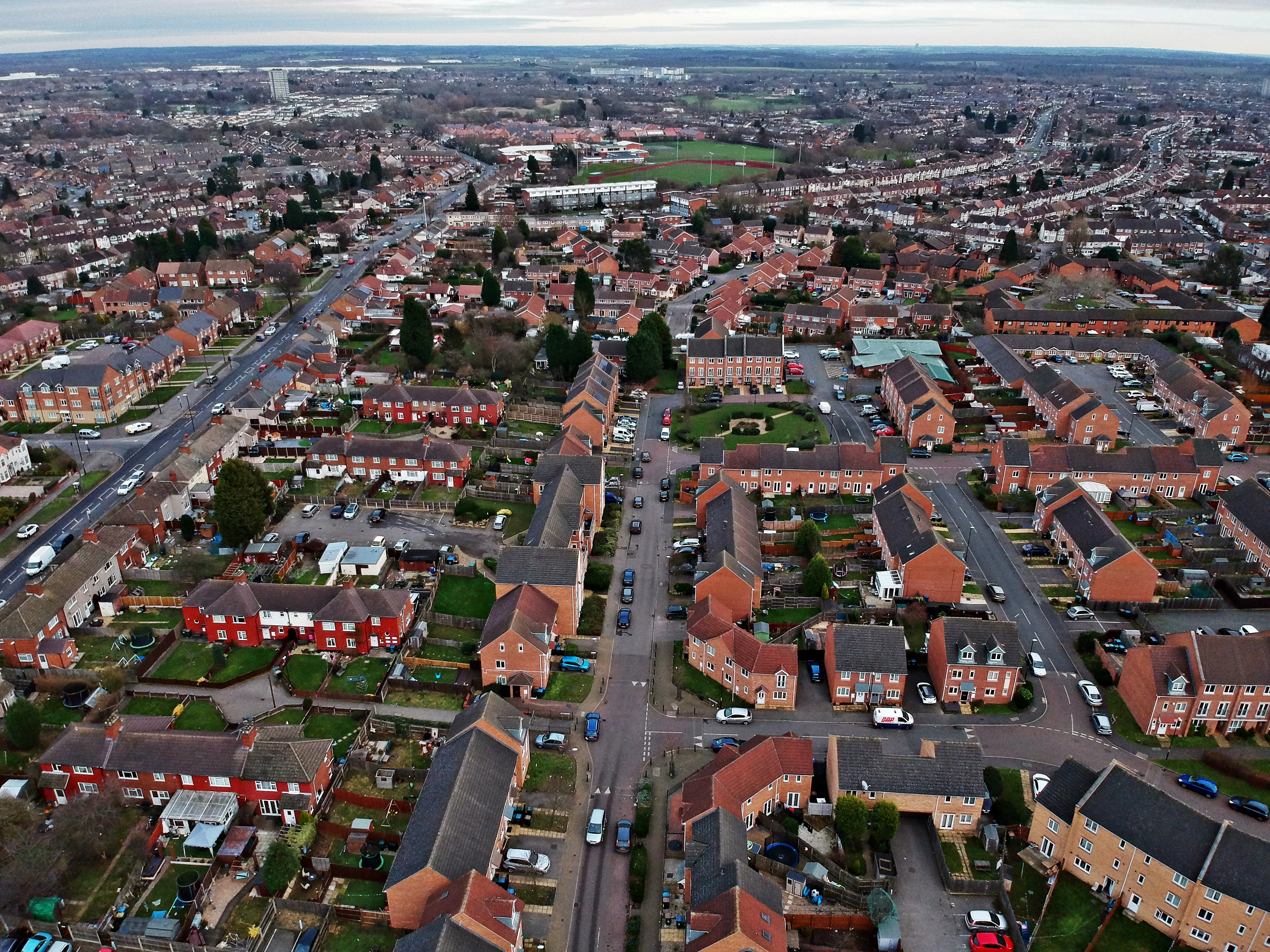 an aerial view of a city with lots of houses
