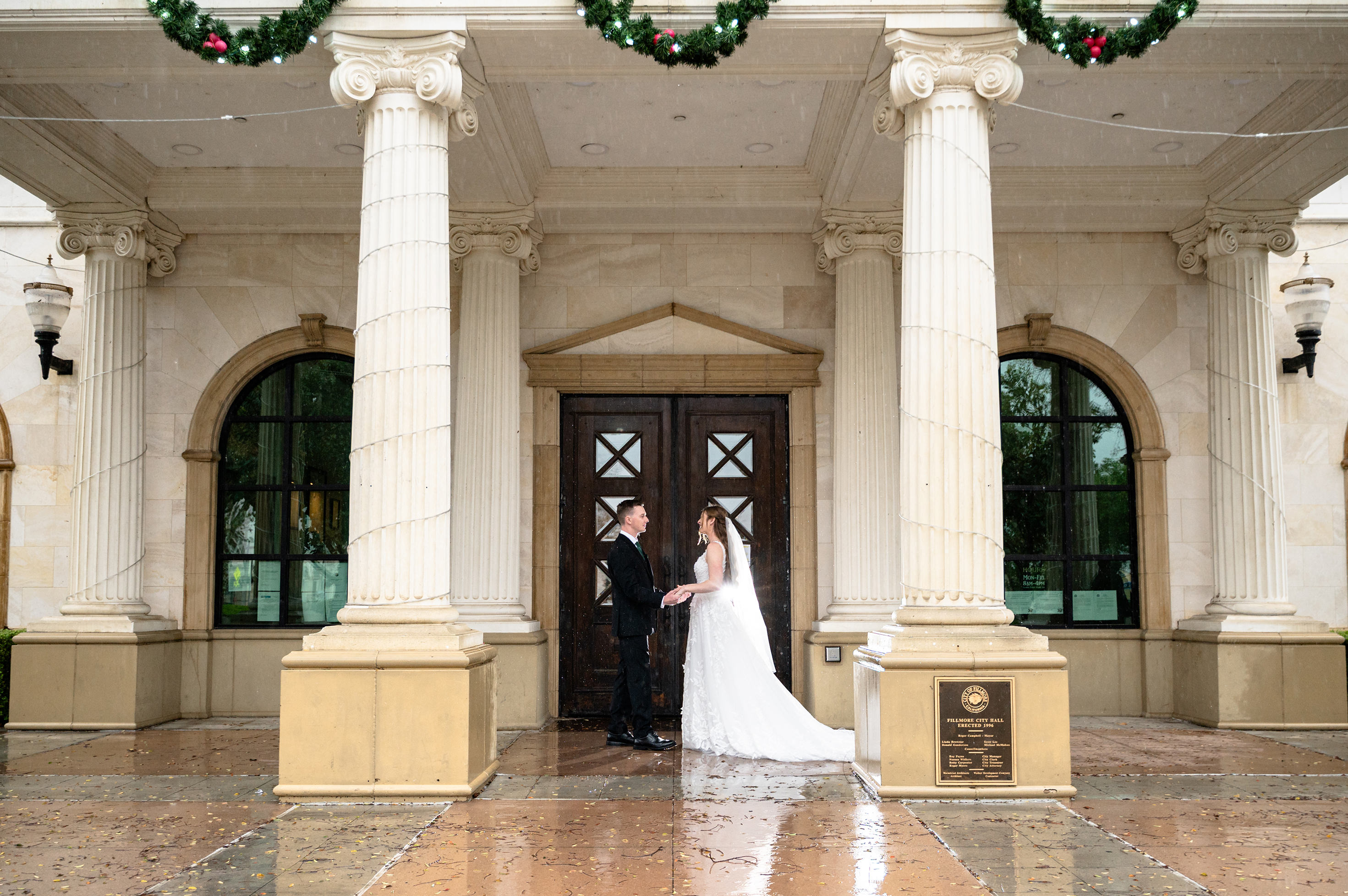 Flat lay wedding details with bouquet, rings, and sparkling bridal heels