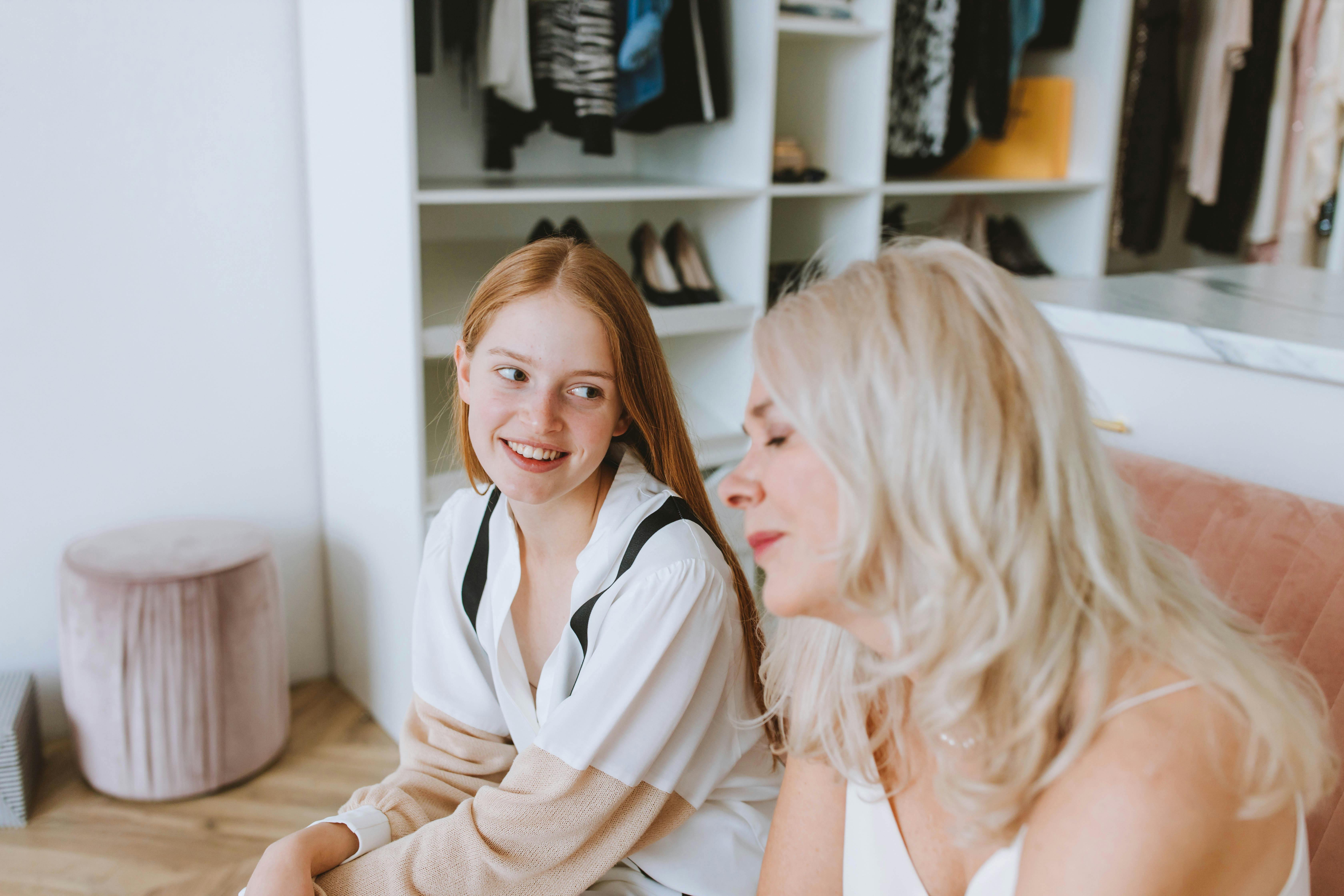 Conversion Truth for Families - Mother and daughter sit on a couch together, appearing relaxed
