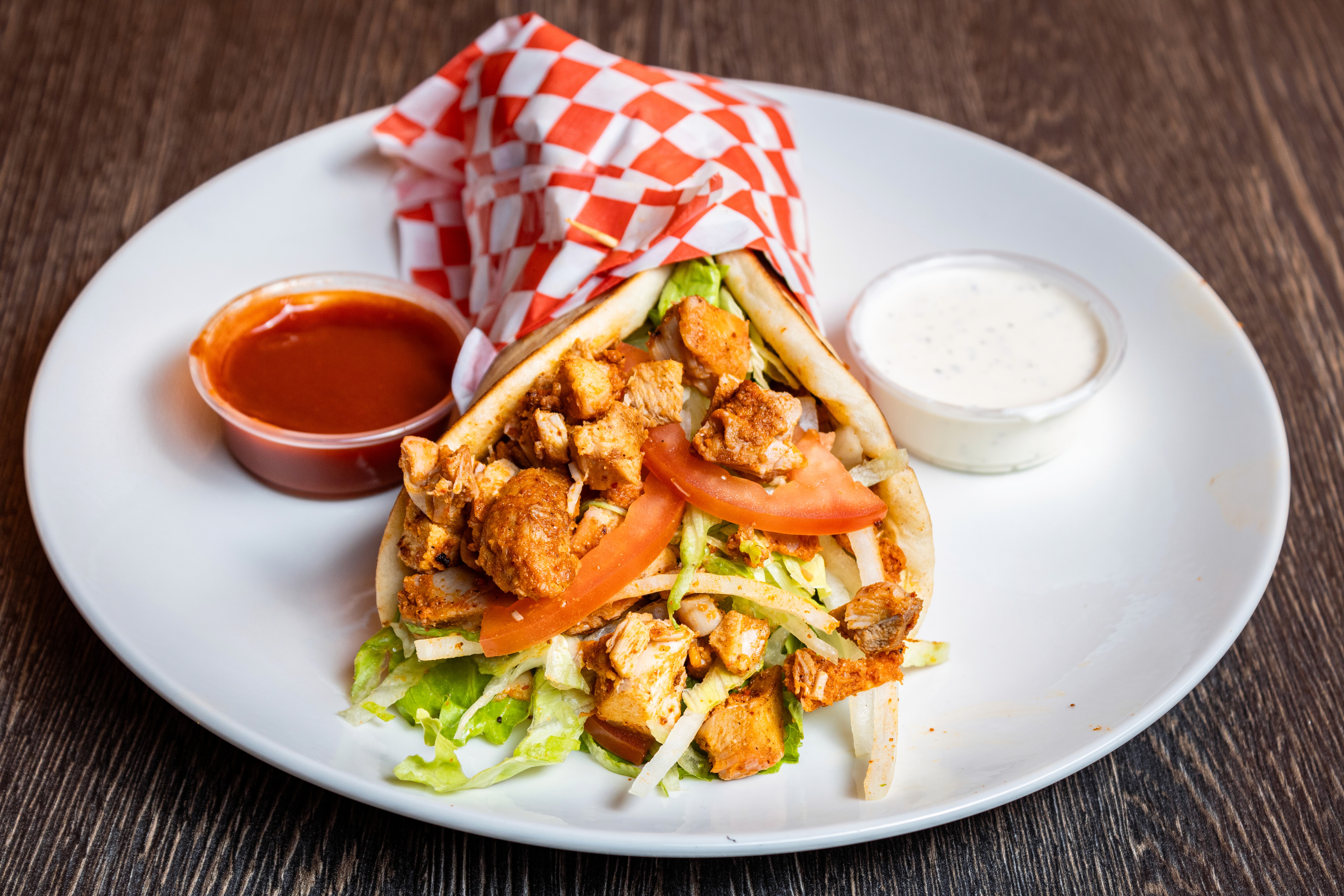 Seared scallops in a white plate