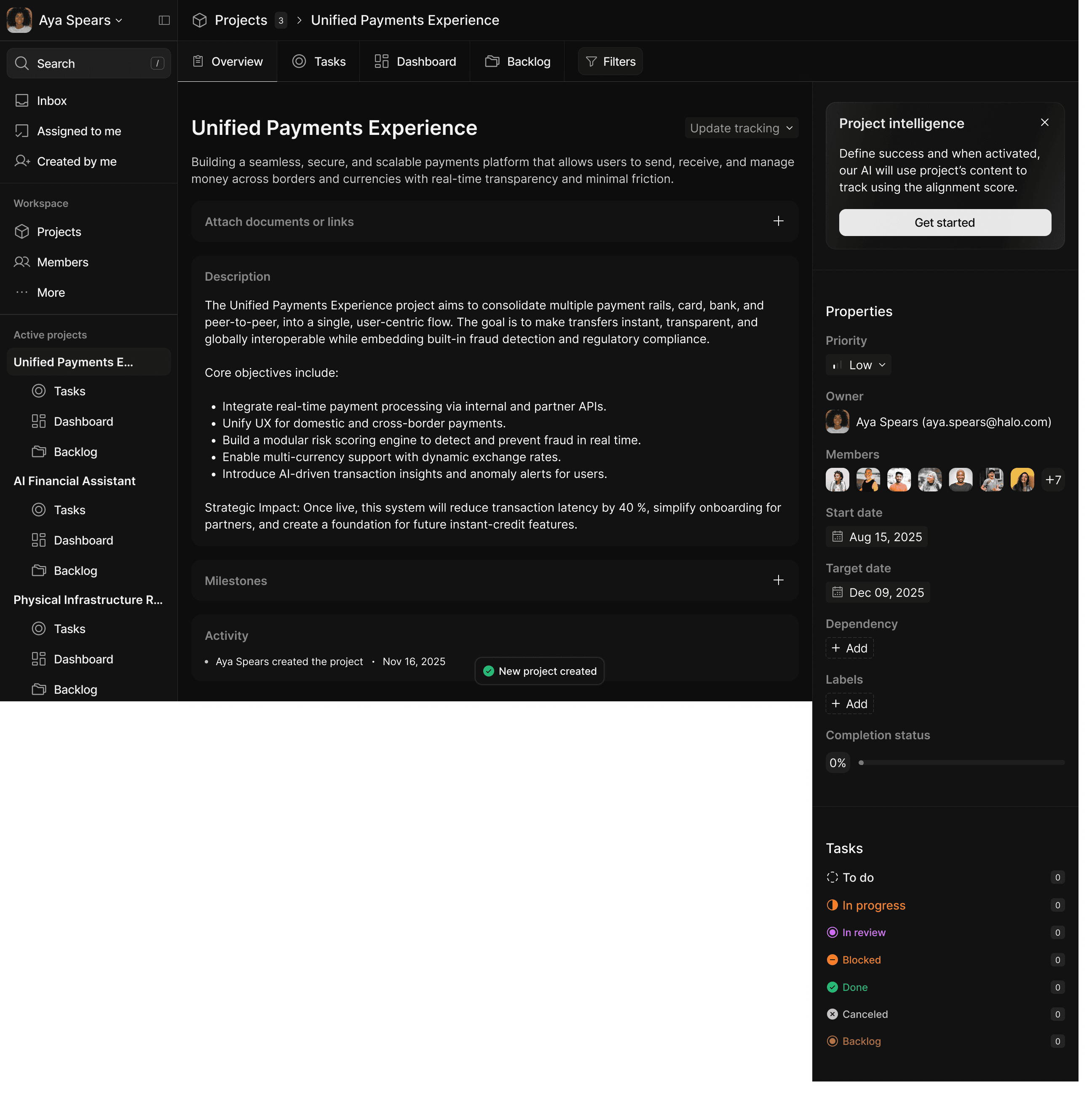 Airport workers guide airplane with tow tractor