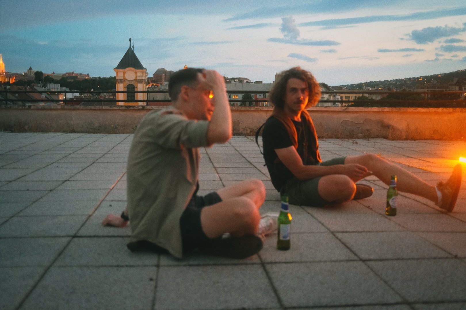 people laughing and talking outside during daytime