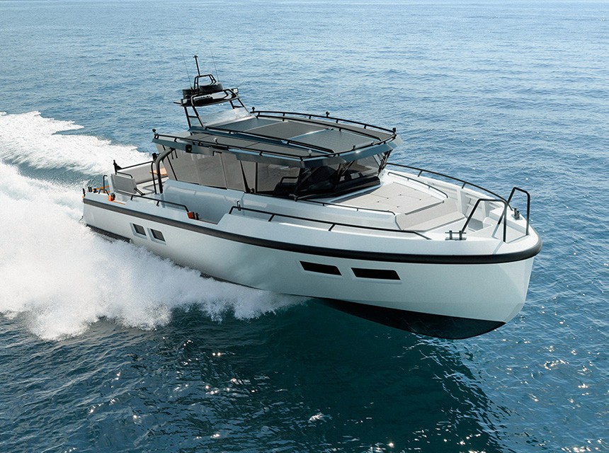 A boat Coastal Explorer moving fast in the blue sea