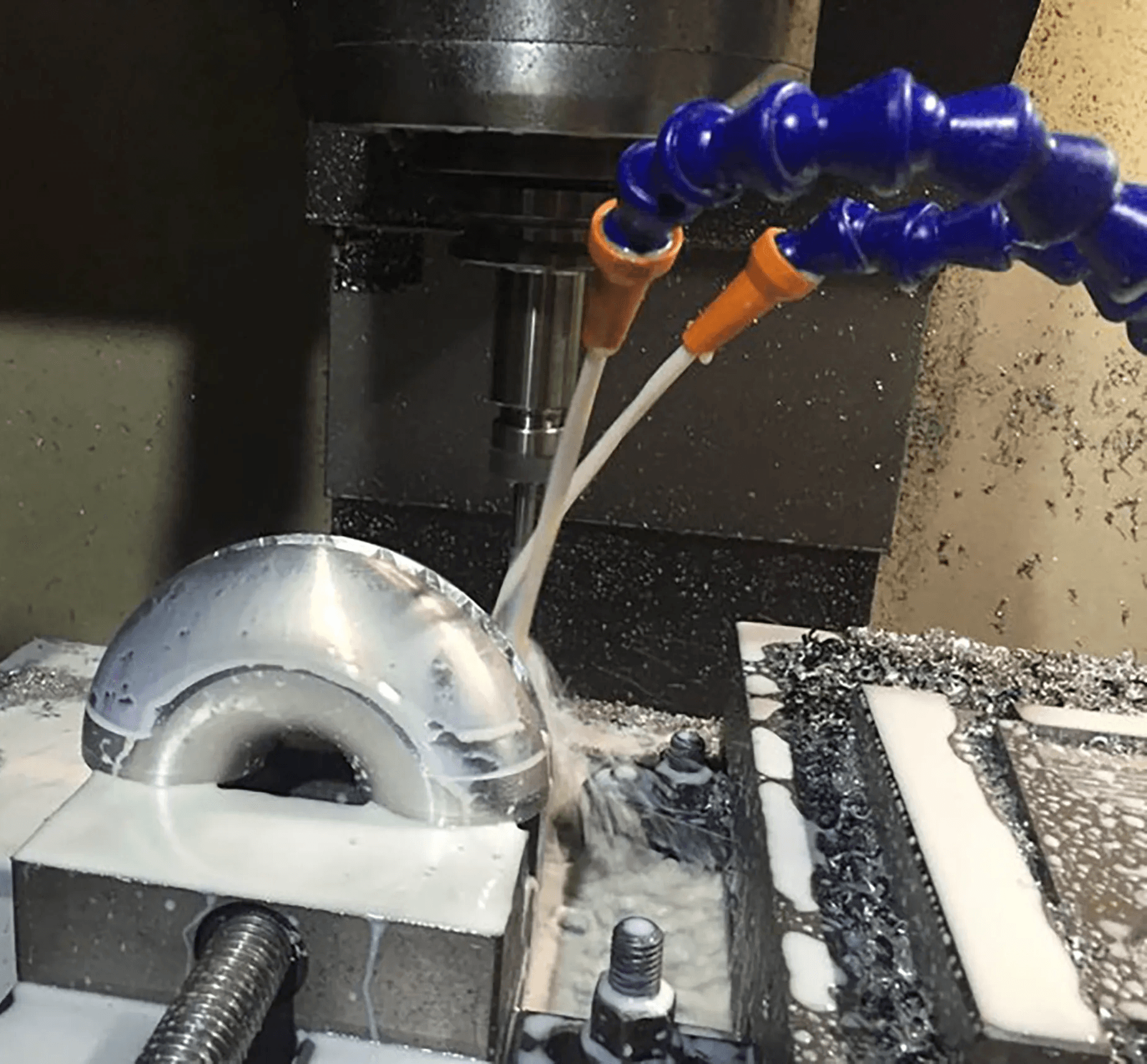 CNC machining an aluminum product component during manufacturing