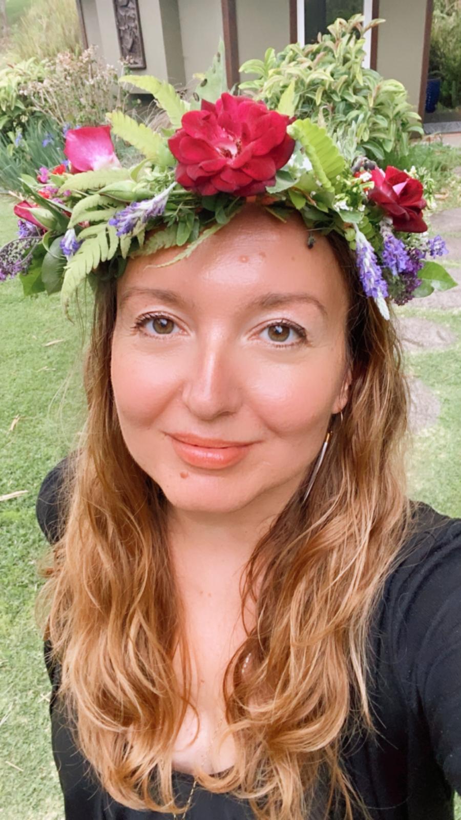 Woman wearing flower crowns.