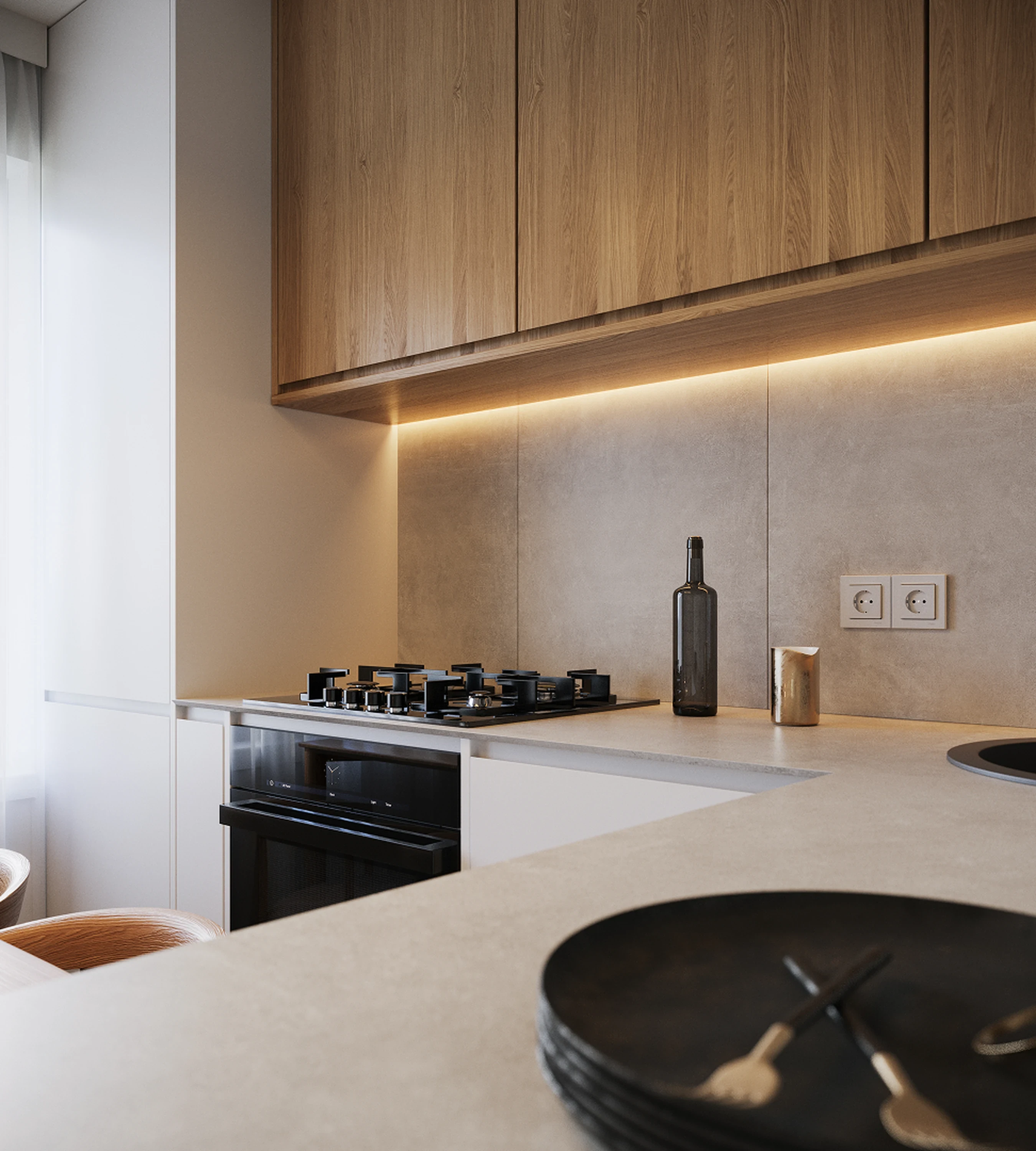 Cuisine — crédence en béton et éclairage sous meuble.