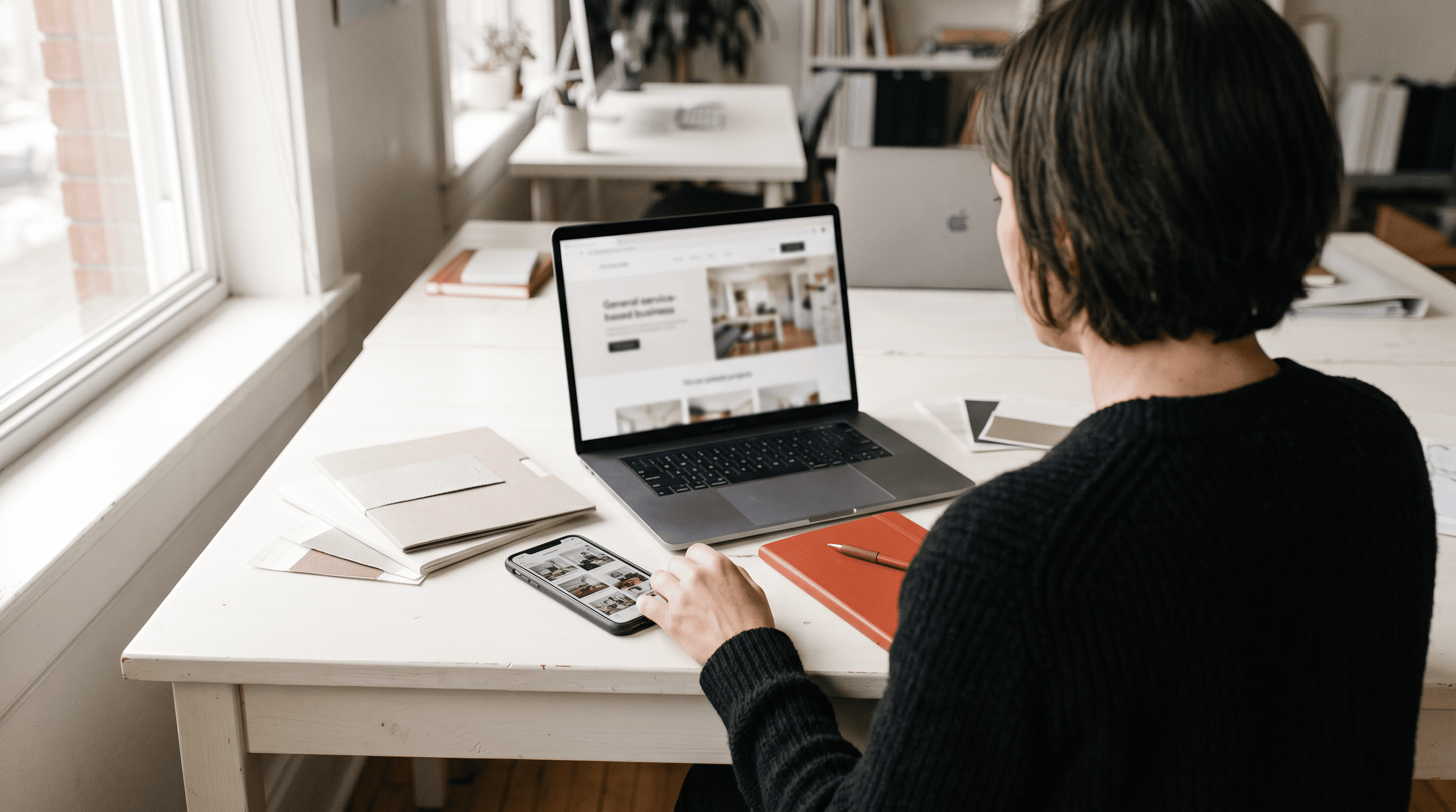AI-generated illustration of a business owner reviewing a website and social portfolio.