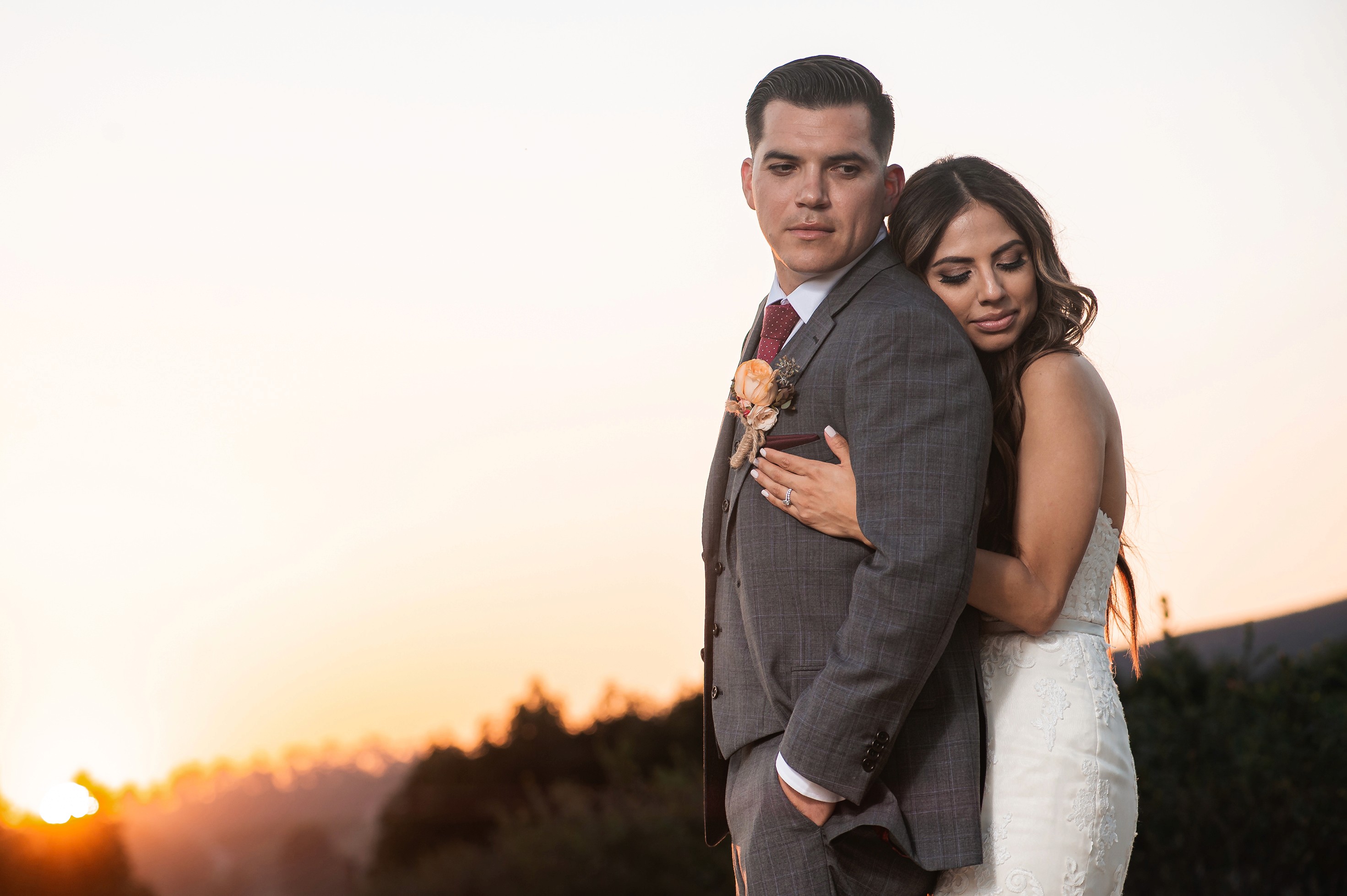 Flat lay wedding details with bouquet, rings, and sparkling bridal heels