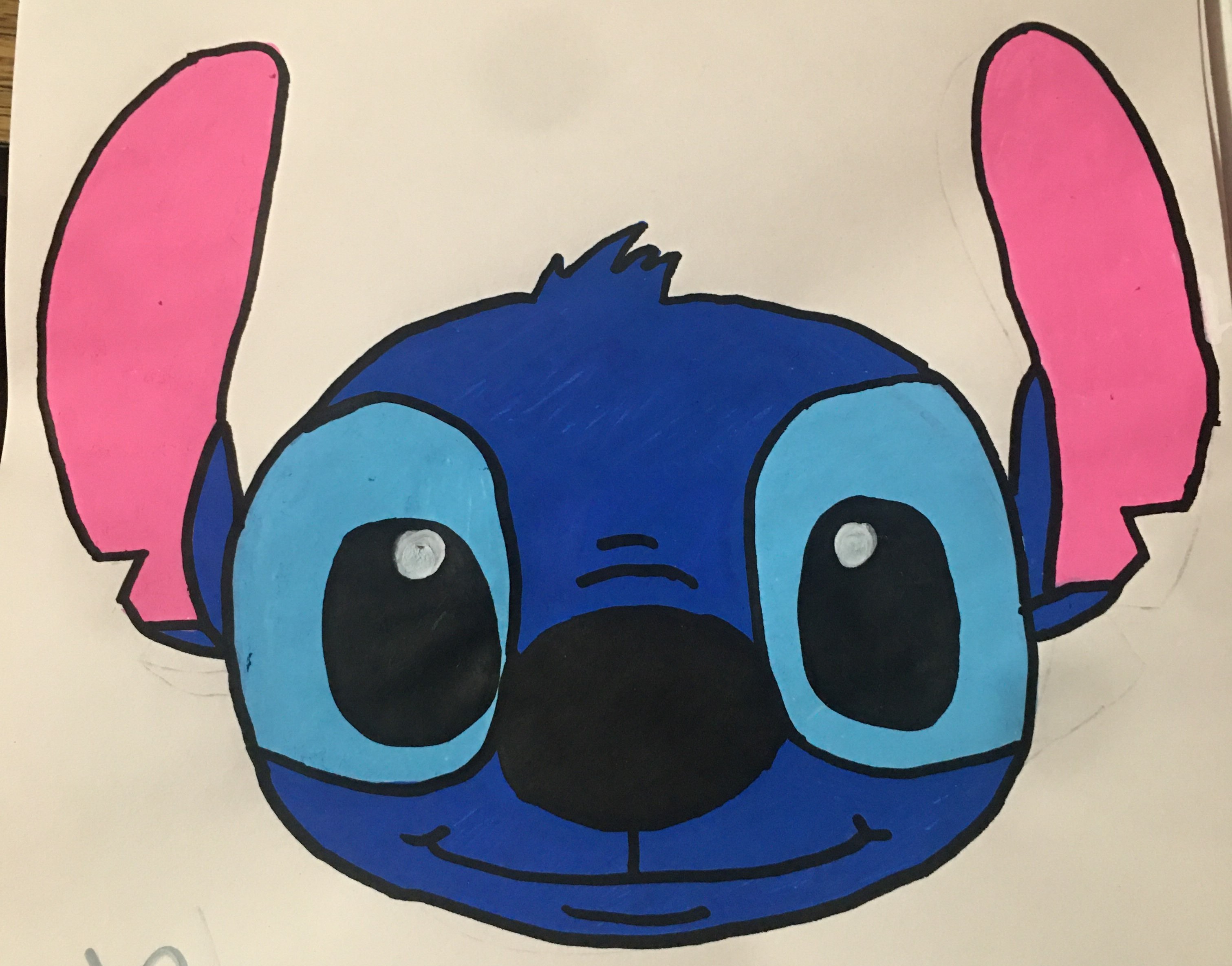 Cartoon character Stitch from the movie "Lilo & Stitch" with blue fur, big eyes, and pink ears, set against a light background.