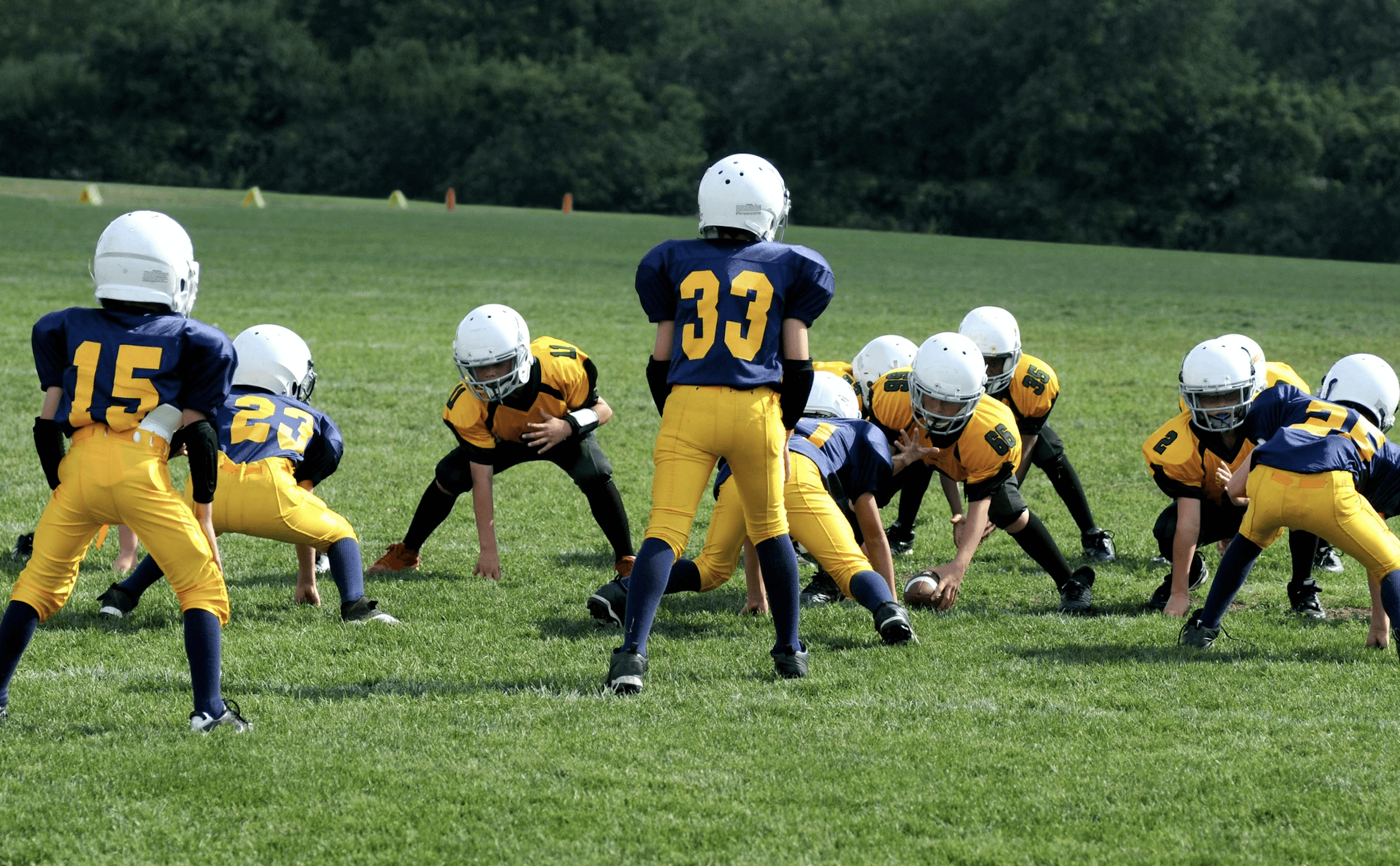youths playing football